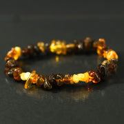 KIZIMA® rainbow Baltic amber bracelet — genuine amber, handmade in USA, side view