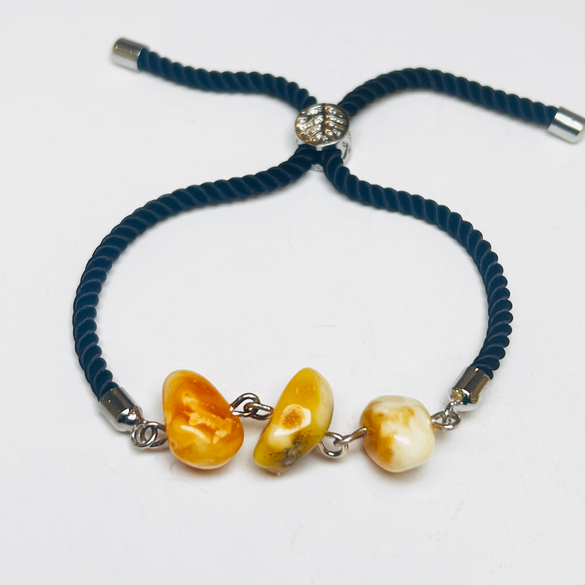 Baltic amber navy cord bracelet 3P0400q4.79, original product photograph