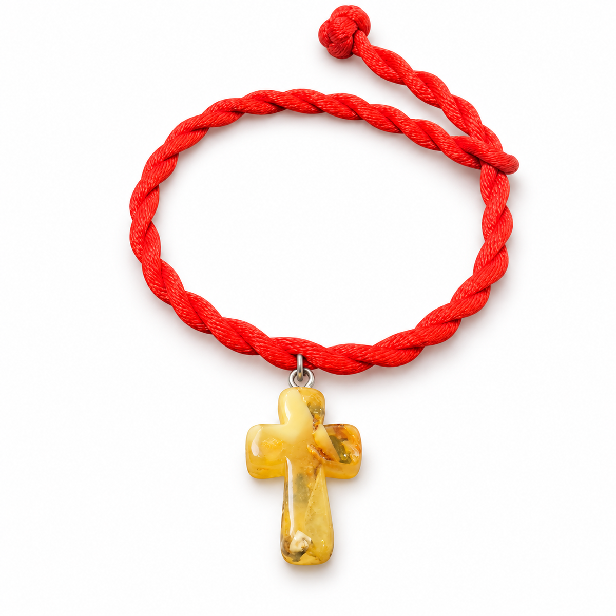 KIZIMA yellow amber cross pendant on red twisted rope bracelet against a pure white background