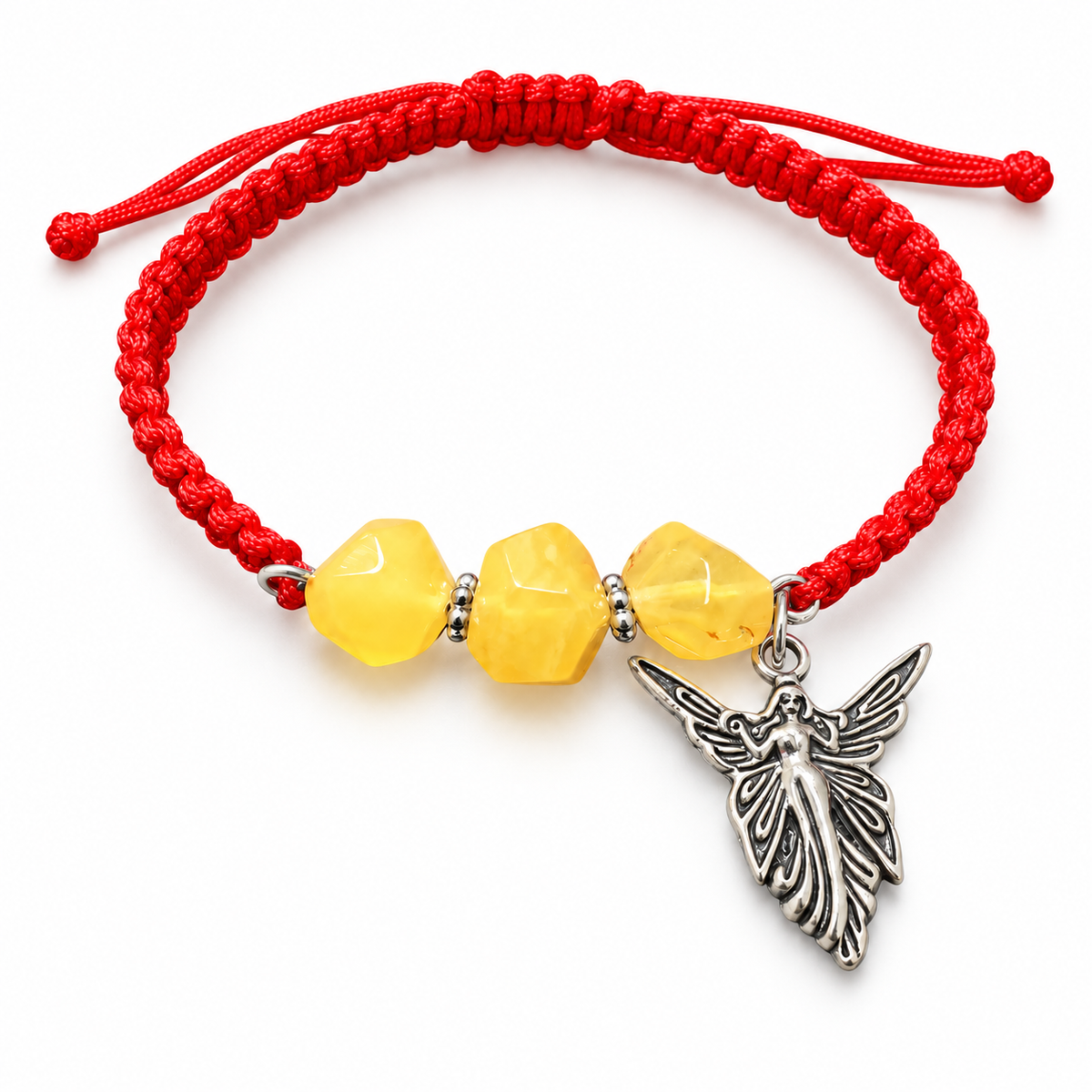 Yellow amber and red macrame bracelet with a silver-colored winged angel pendant, isolated on white.