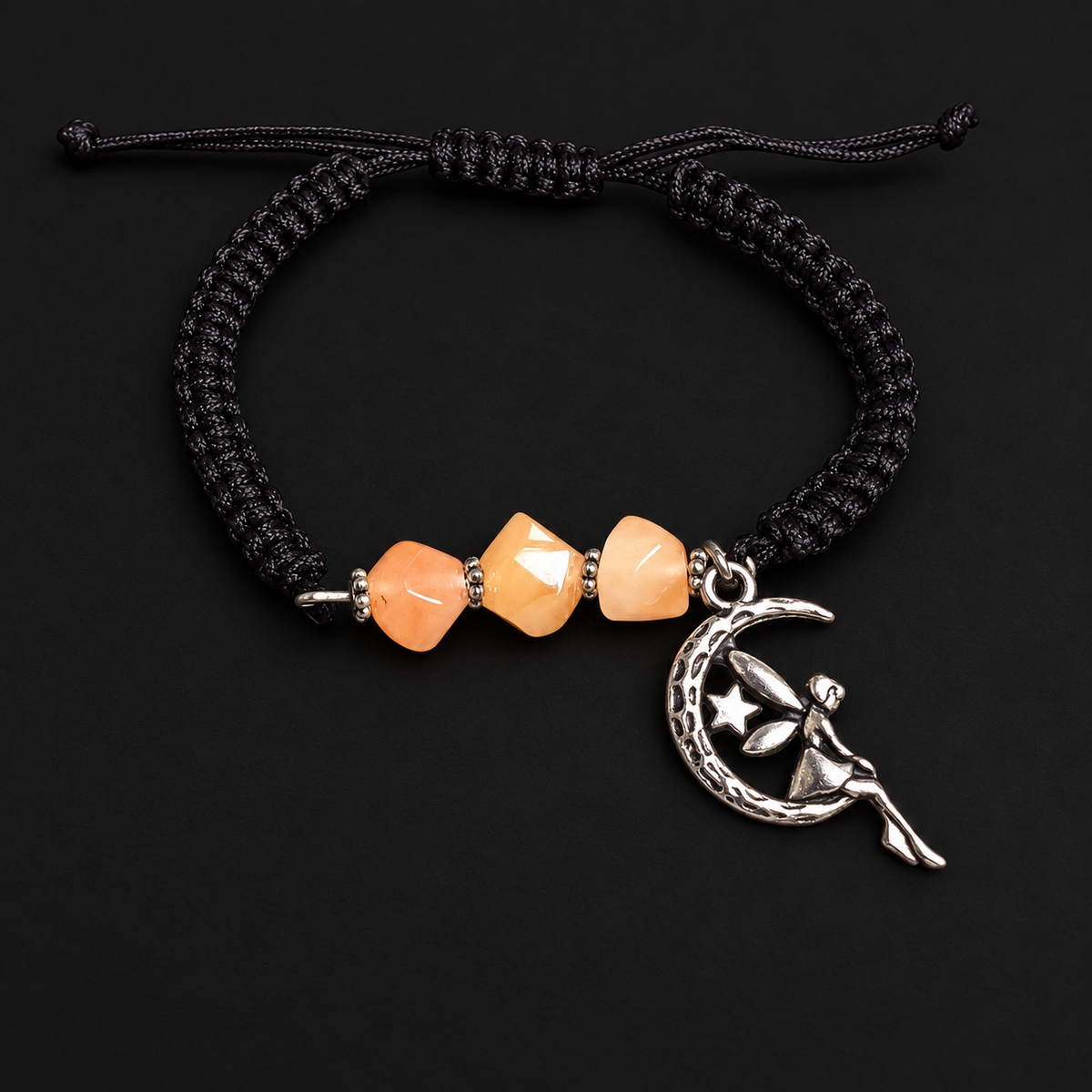 KIZIMA three peach amber stones and silver-tone moon fairy charm on black macrame bracelet in black studio
