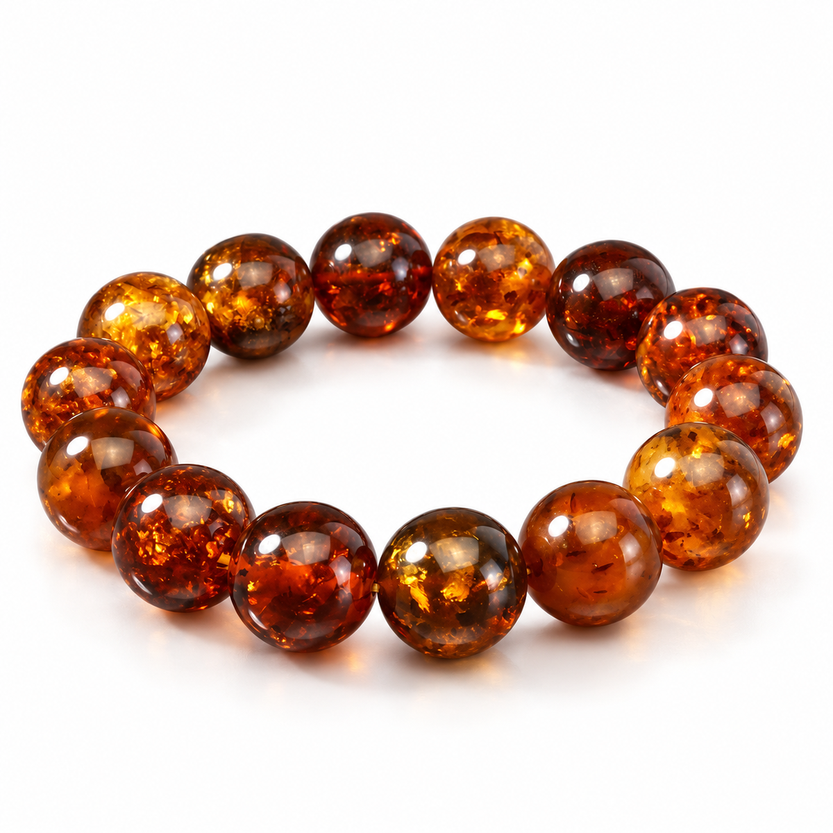 KIZIMA 3K0720q20.56.1 fourteen-bead cognac Baltic amber stretch bracelet on a pure white background.
