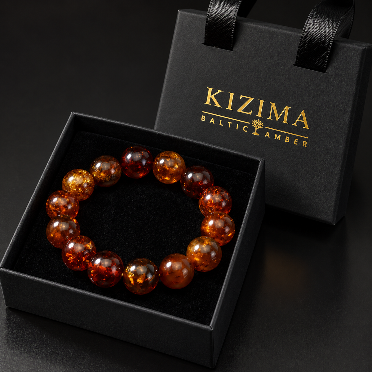 KIZIMA 3K0720q20.56.1 fourteen-bead cognac Baltic amber stretch bracelet in the KIZIMA black velvet gift box.