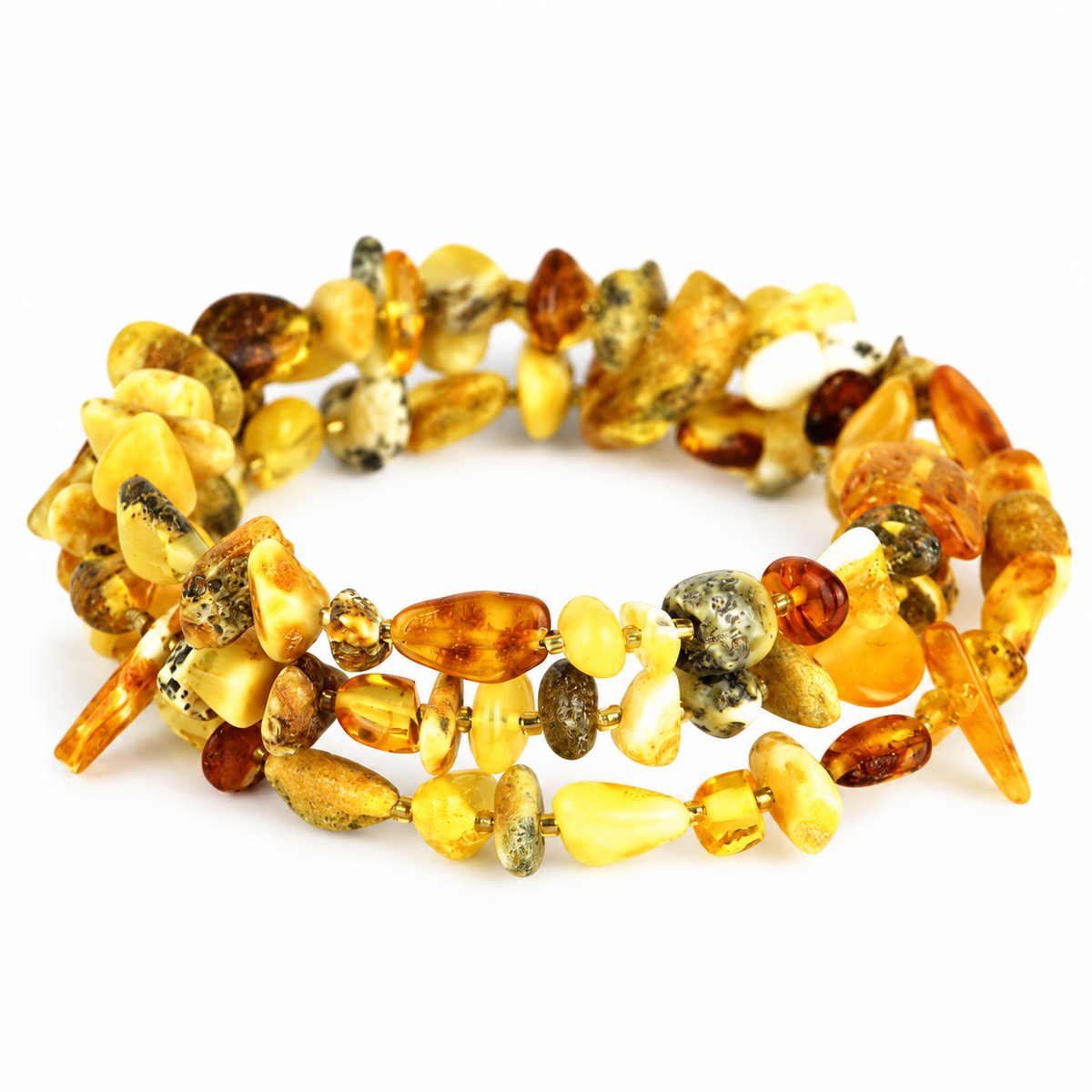 Honey, cream, cognac and speckled amber chips in a spiral bracelet on pure white.