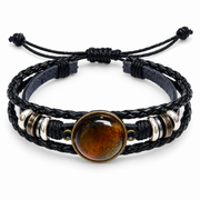KIZIMA 3N0180q8.4 round cognac amber cabochon multi-strand black leather bracelet on a pure white background