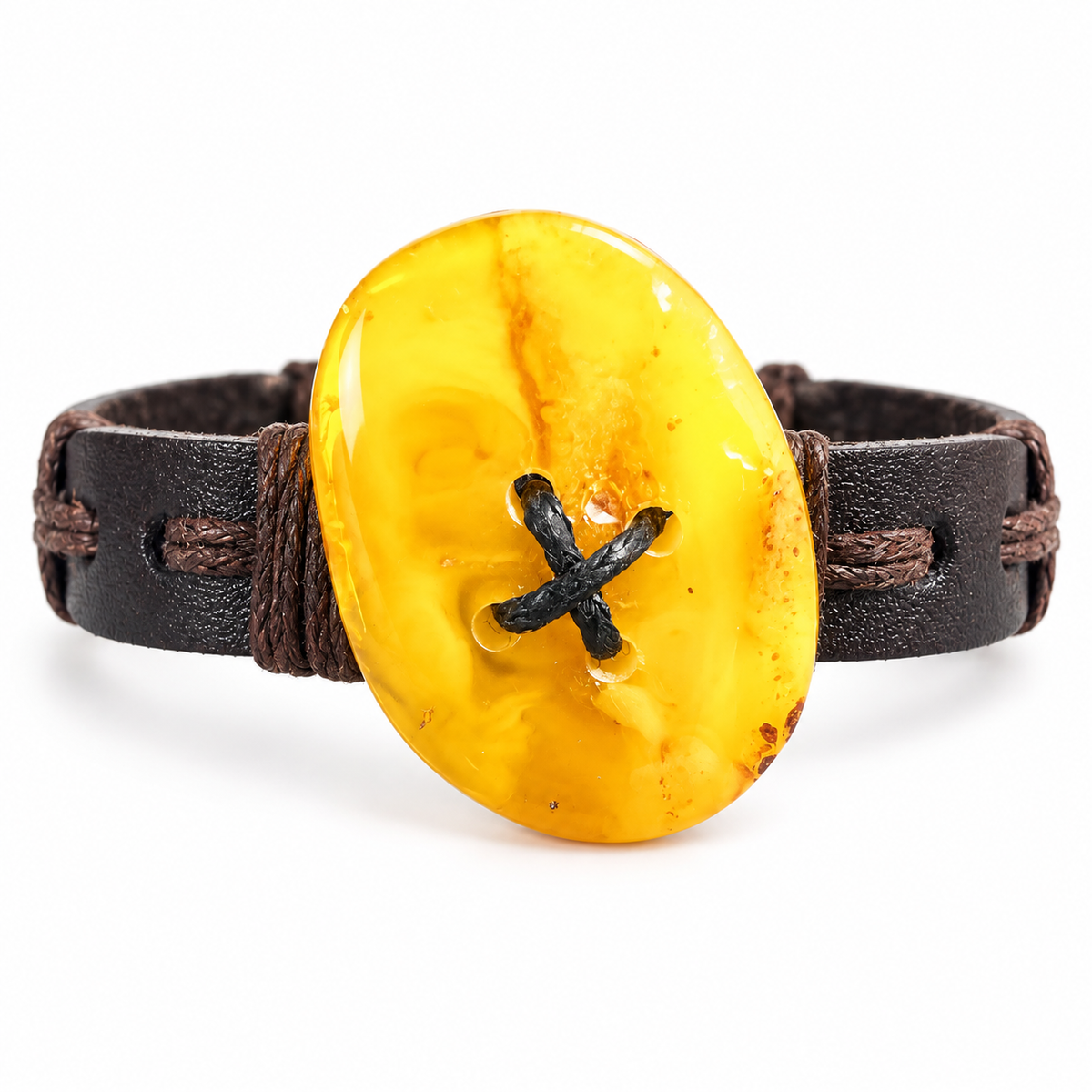 KIZIMA yellow oval amber bracelet with black cross lacing and flat dark leather band on a pure white background