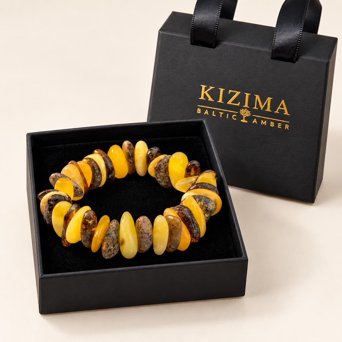 KIZIMA 3N0250q17.31 yellow and dark amber chip bracelet on clean black velvet in its KIZIMA gift box
