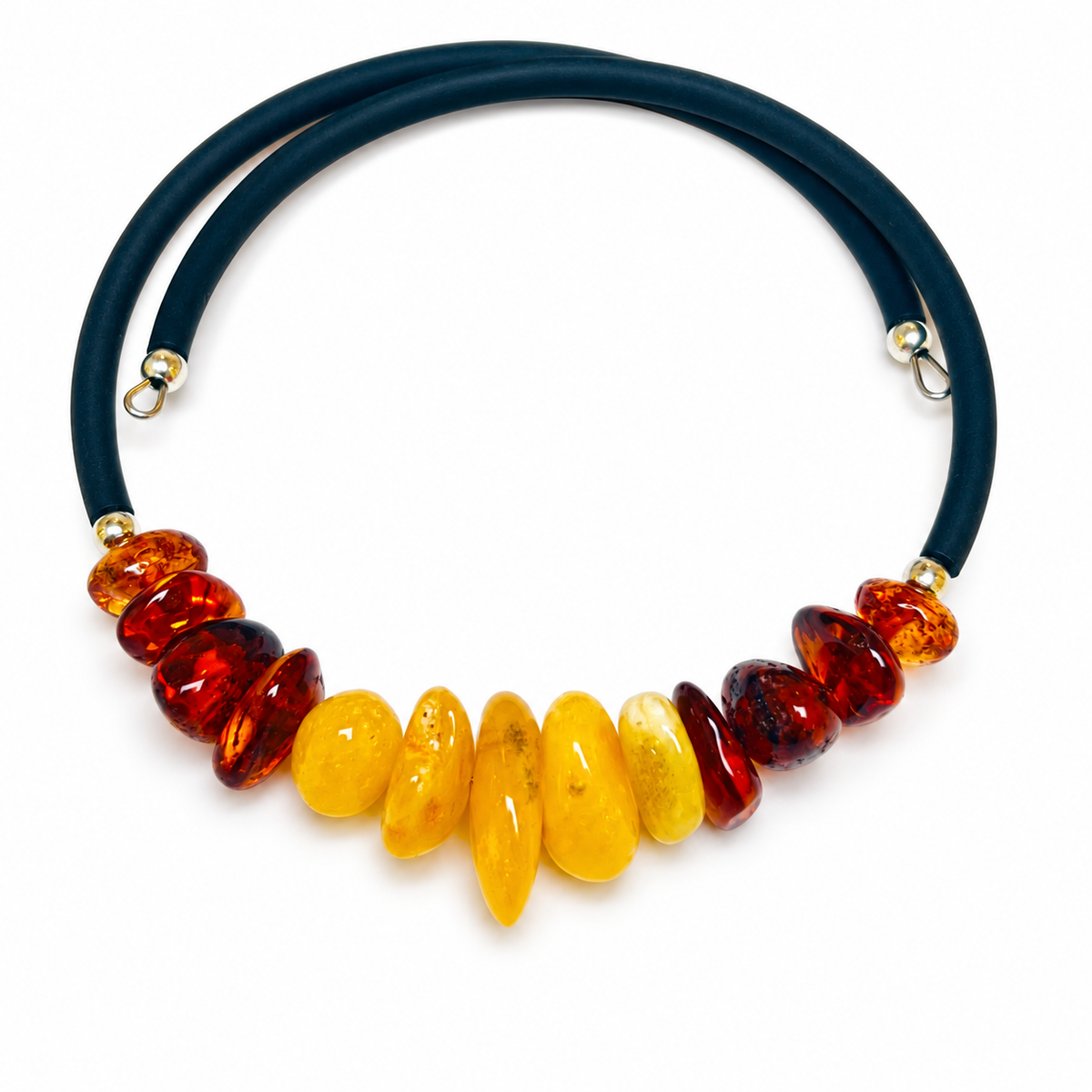 KIZIMA thirteen-stone yellow and cognac amber open wrap bracelet on a pure white background.