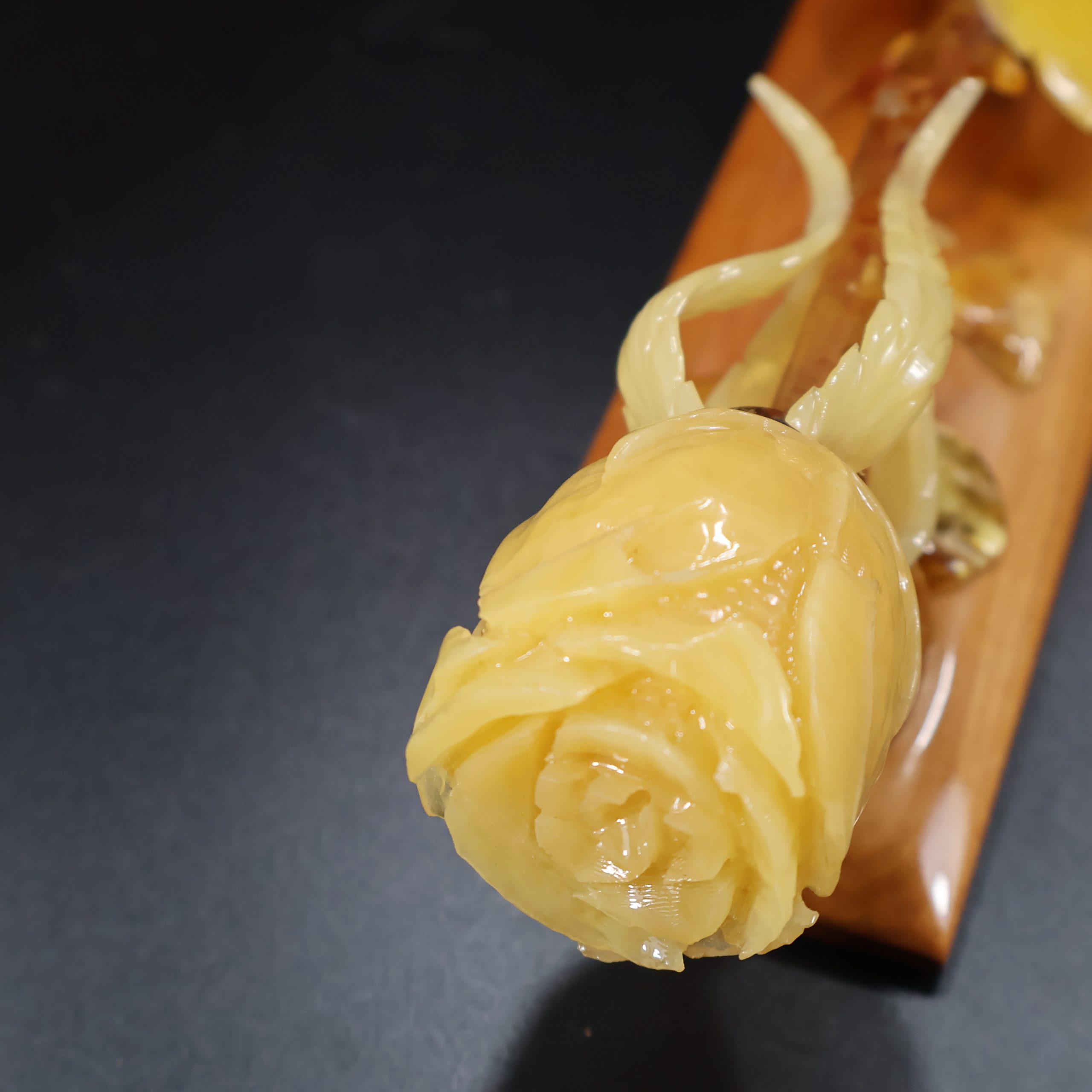 Luxury Amber Rose: Solid Stone on Mahogany