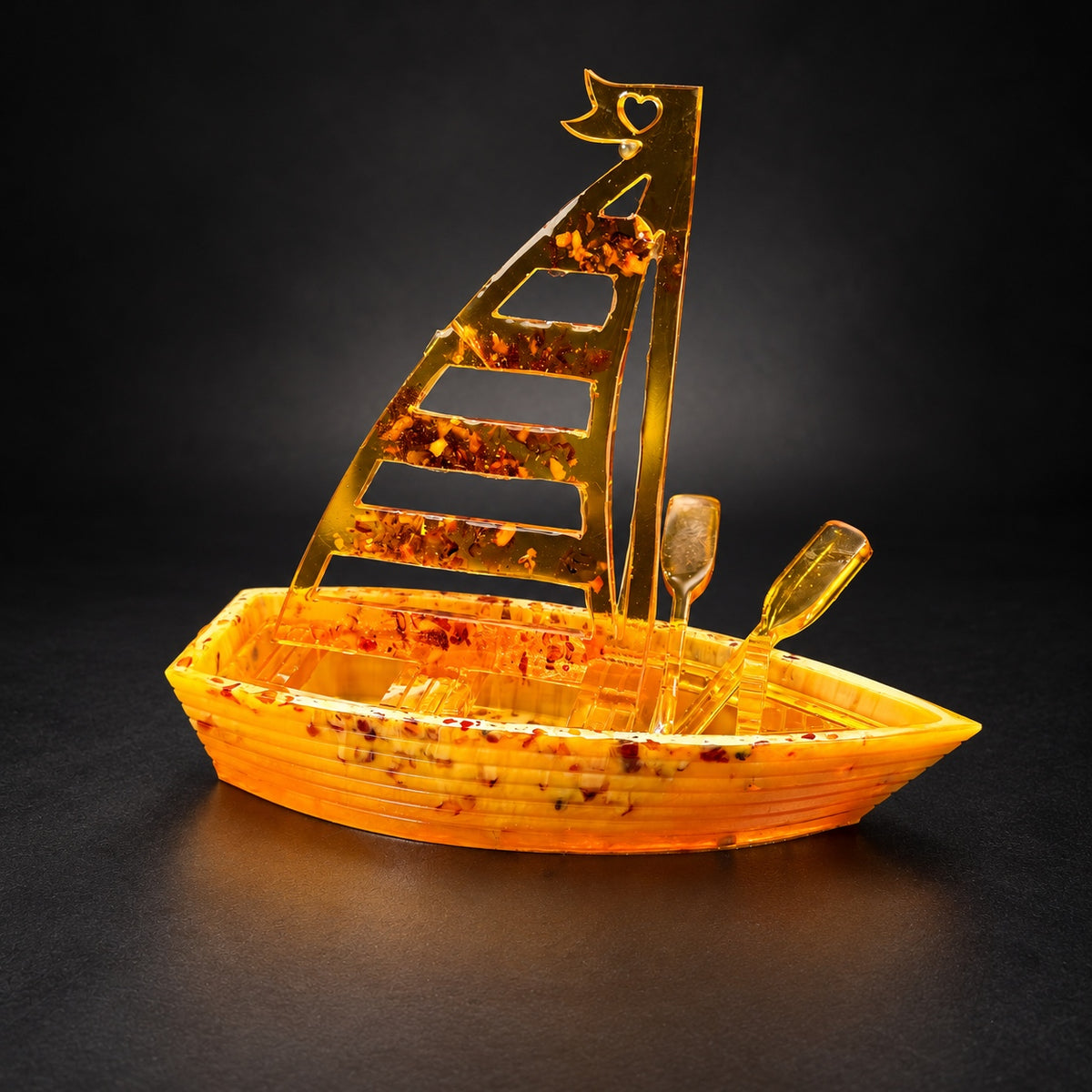 KIZIMA Sailboat with oars 45SHIP1Q150-18-17-16 on a charcoal studio background.