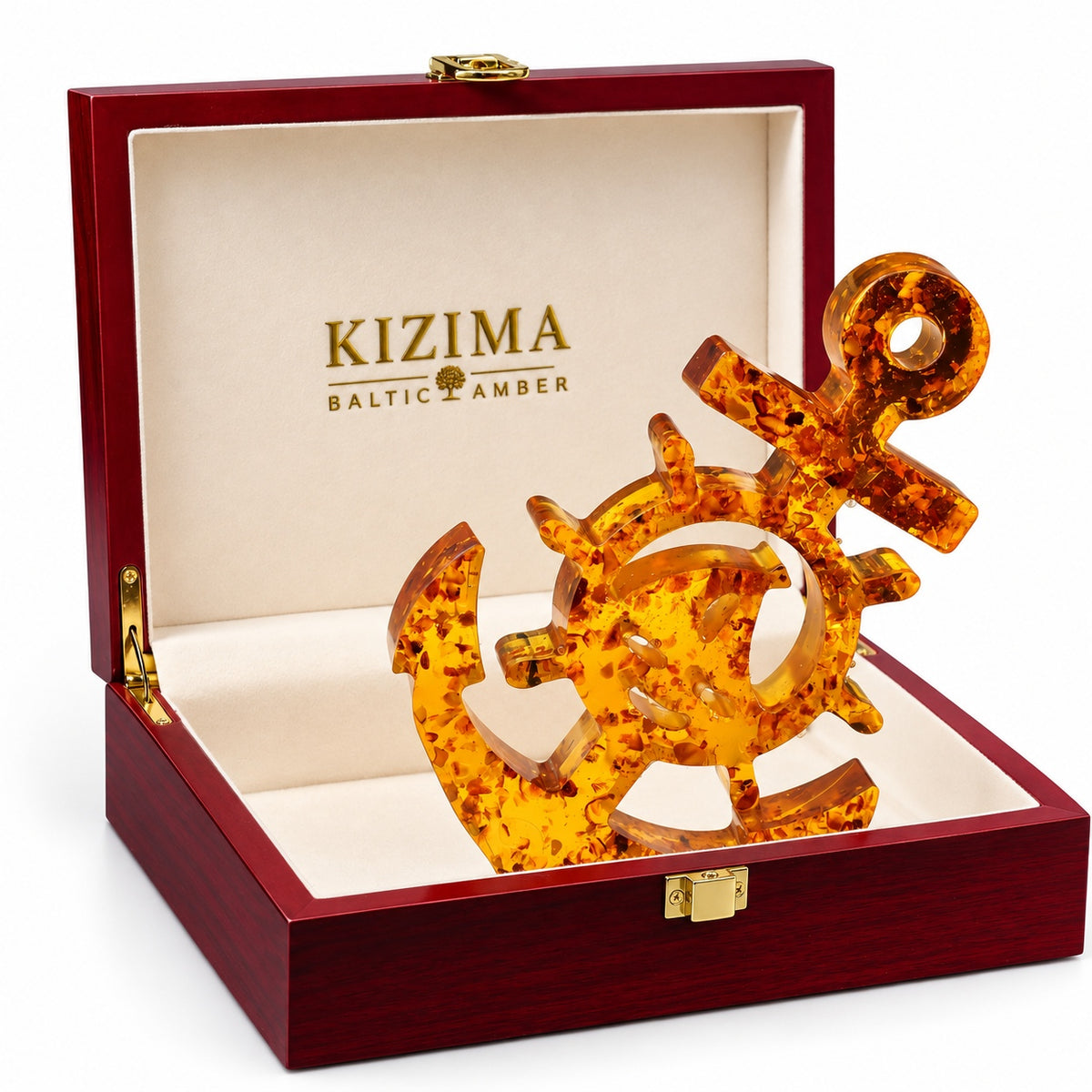 KIZIMA Baltic amber anchor in its burgundy presentation box with cream lining on a white background.