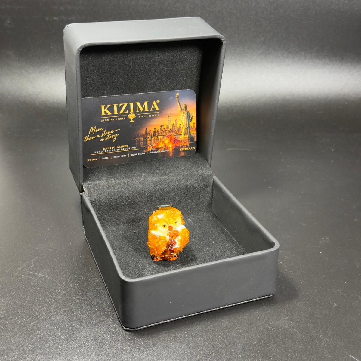 Original photograph of owl figurine with KIZIMA box and brand card