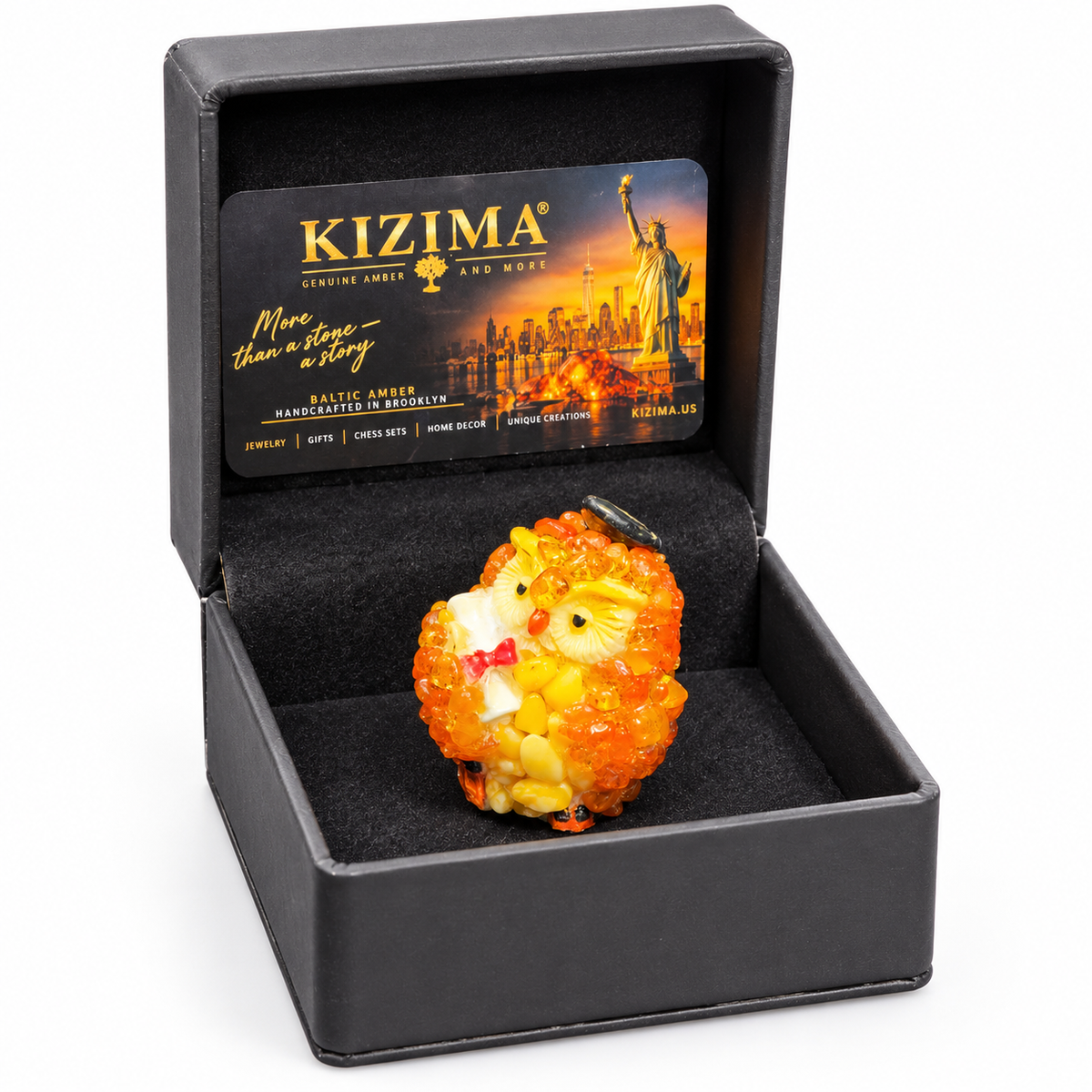 Graduation owl figurine in its open black KIZIMA presentation box