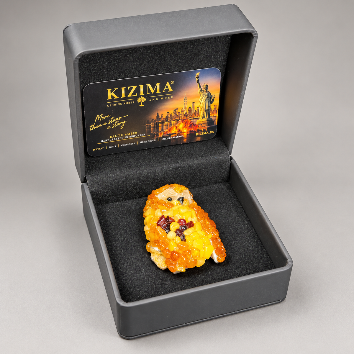 Amber owl refrigerator magnet with its KIZIMA gift box.