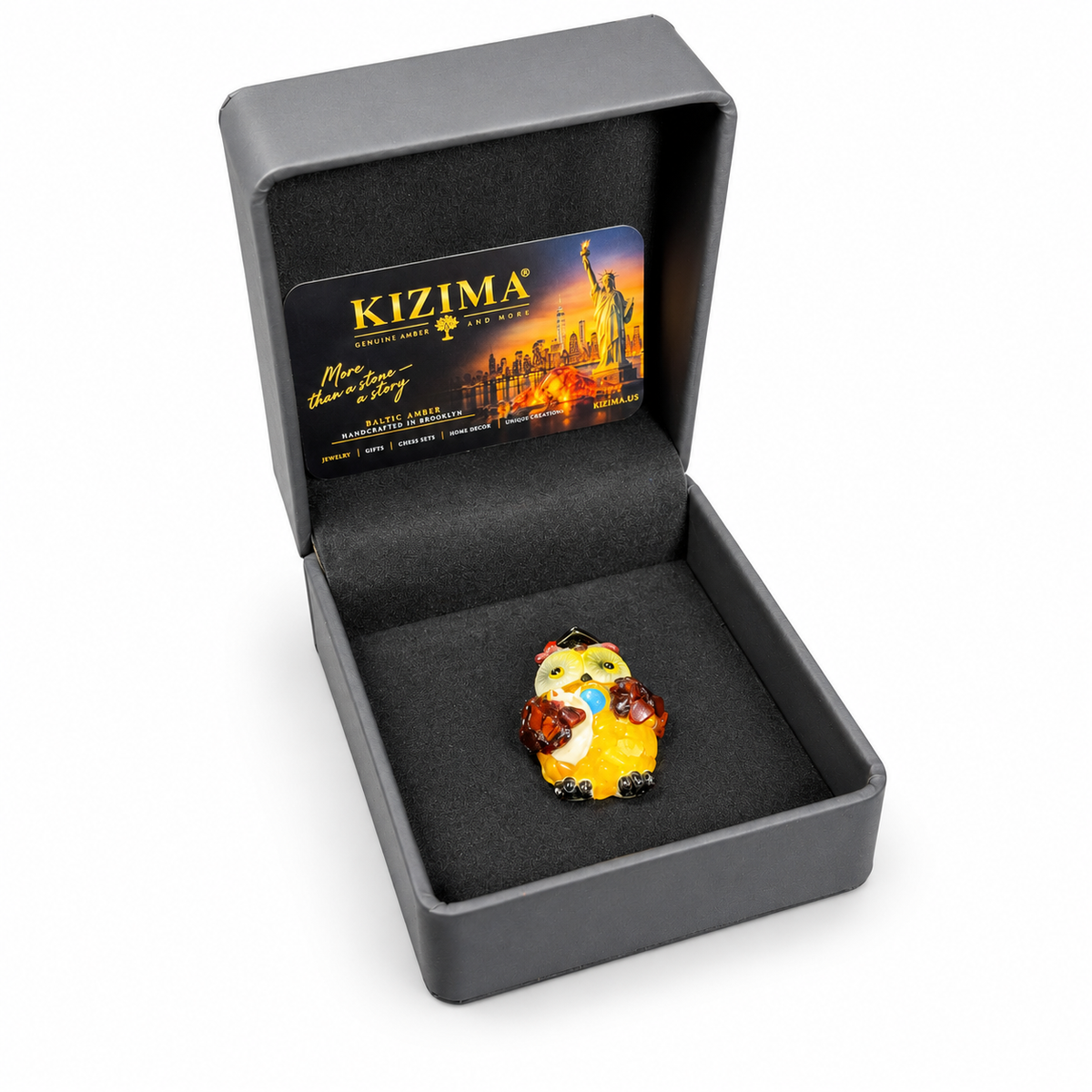Graduation owl magnet in its open charcoal-gray KIZIMA presentation box with black lining