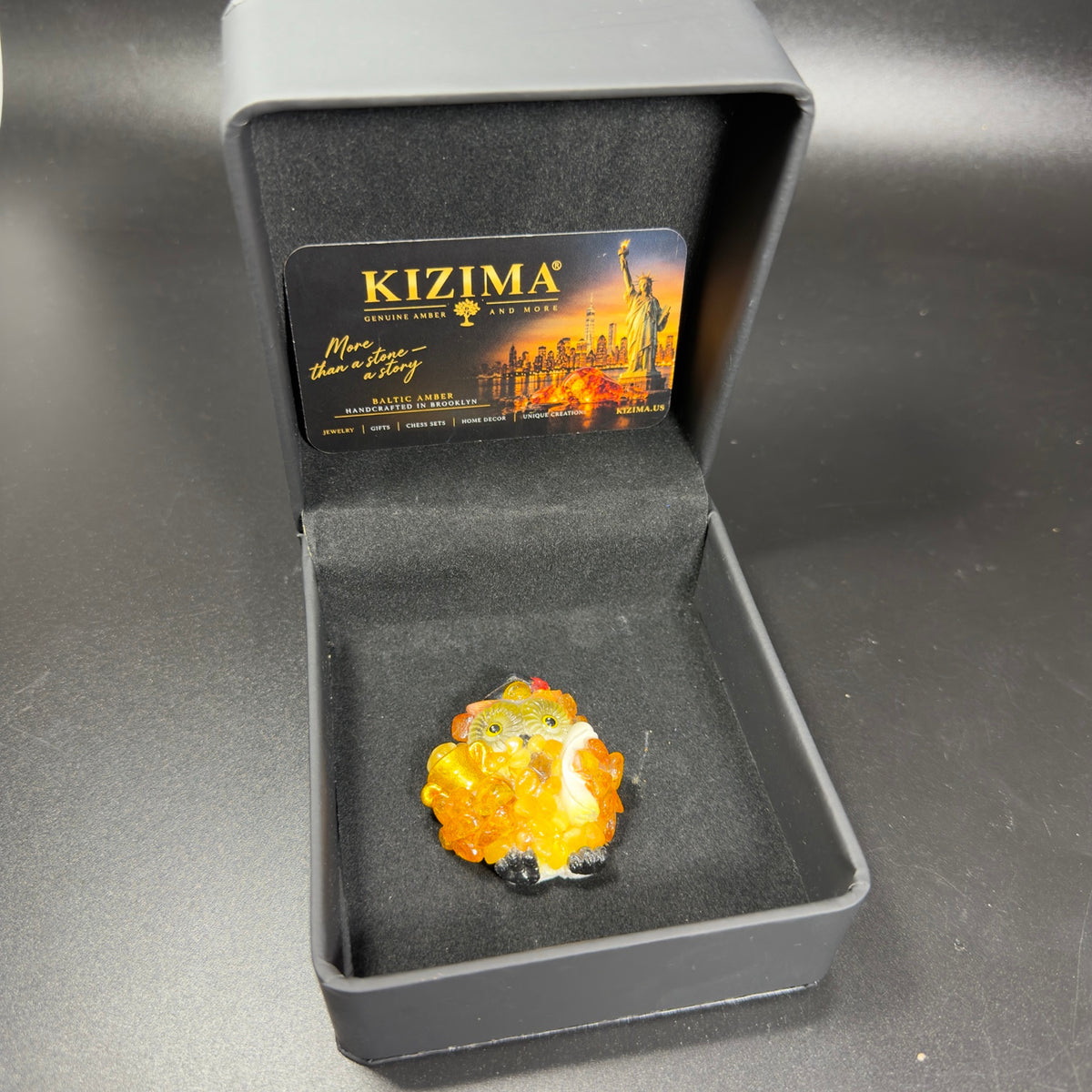 Original photograph of KIZIMA owl refrigerator magnet in presentation box