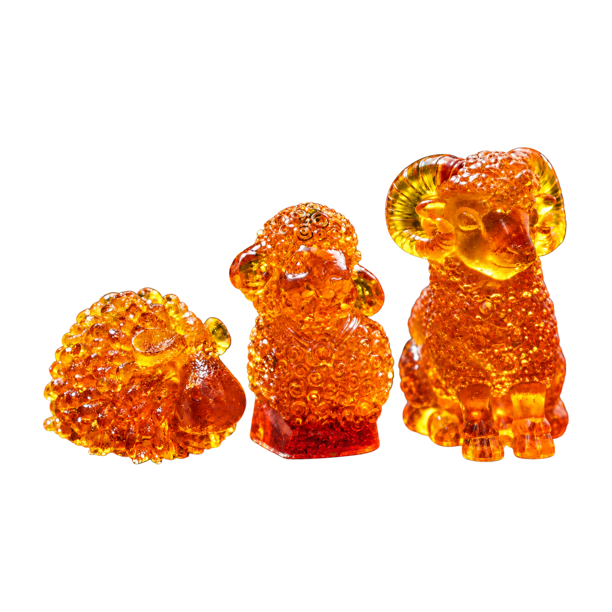 49SANYANGQ174-6-6-7 — Baltic amber three rams set on white background