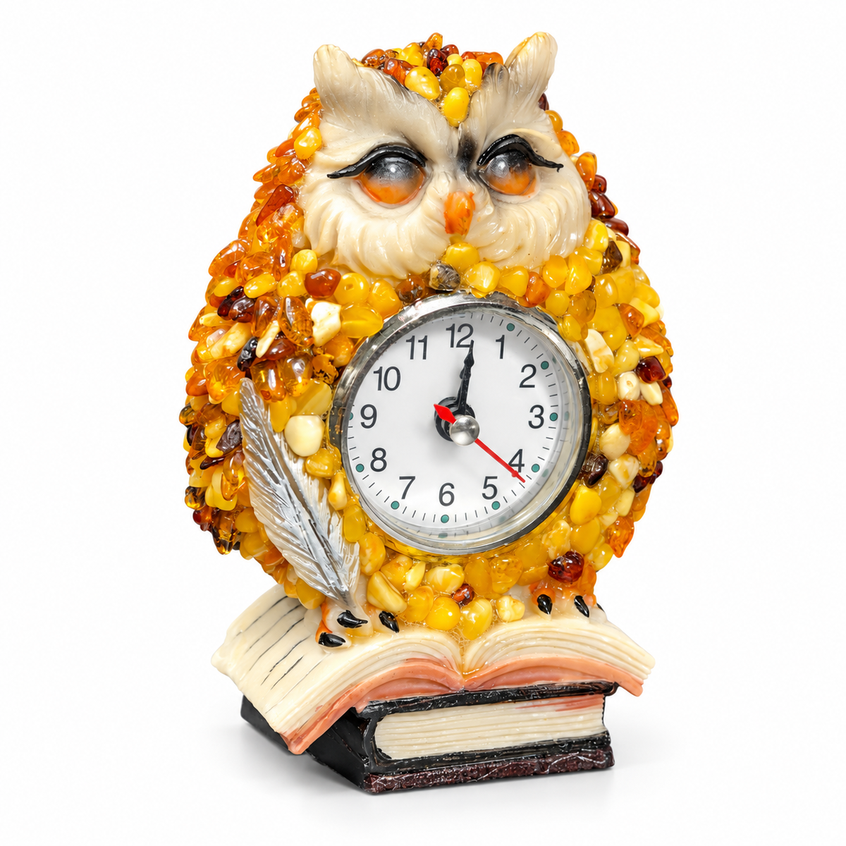 Handmade Baltic amber owl quartz clock with a silver quill and open book base on a white background.
