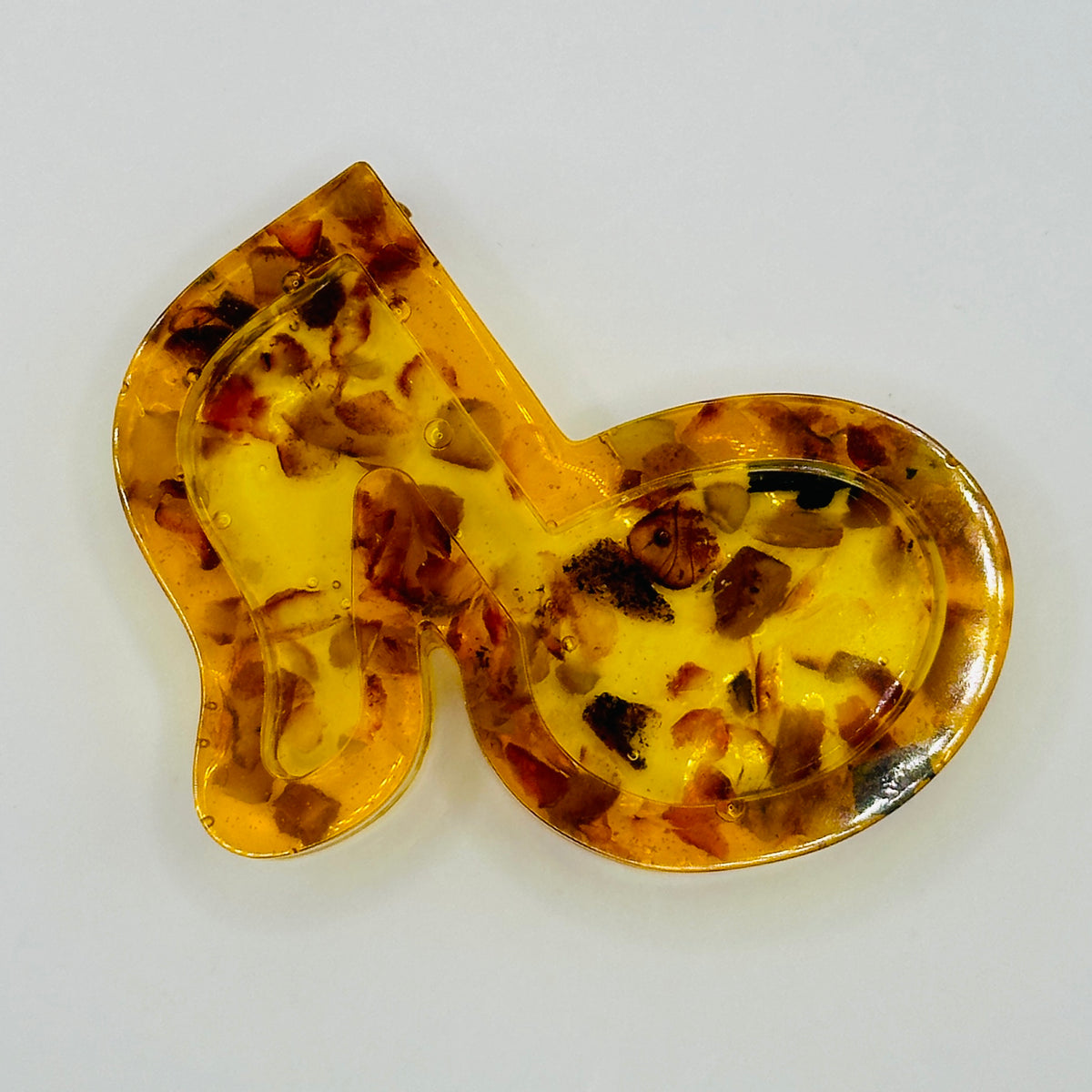Original photograph of Baltic amber music note sculpture 54K15q7
