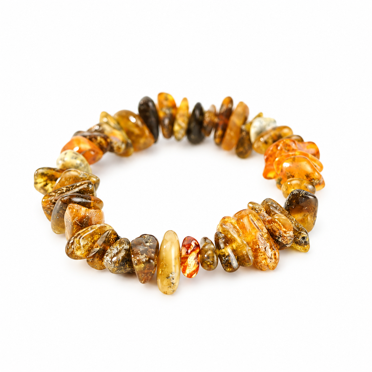 Honey, olive and dark mottled amber nuggets in a stretch bracelet on pure white.