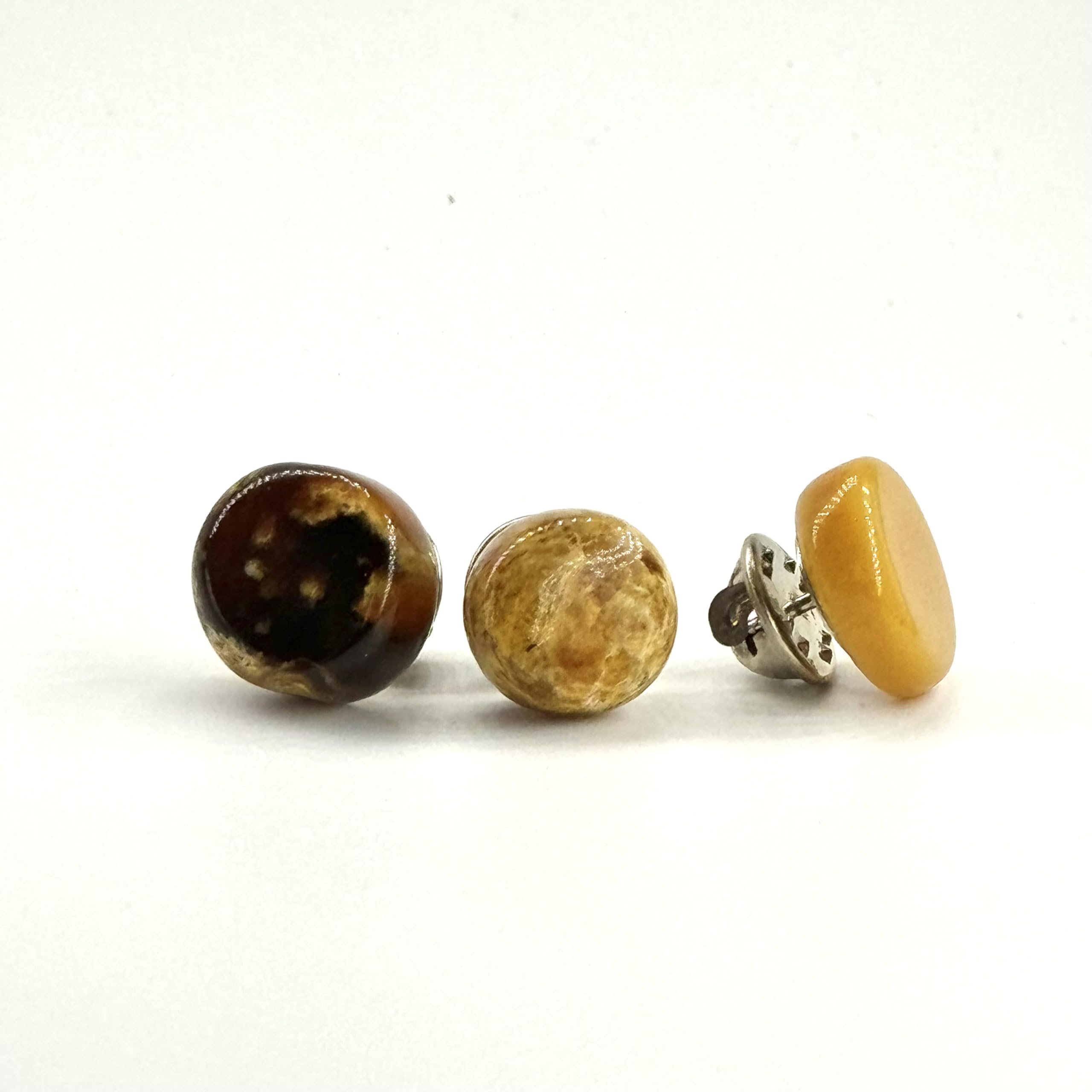 Amber brooch handmade with natural Baltic button
