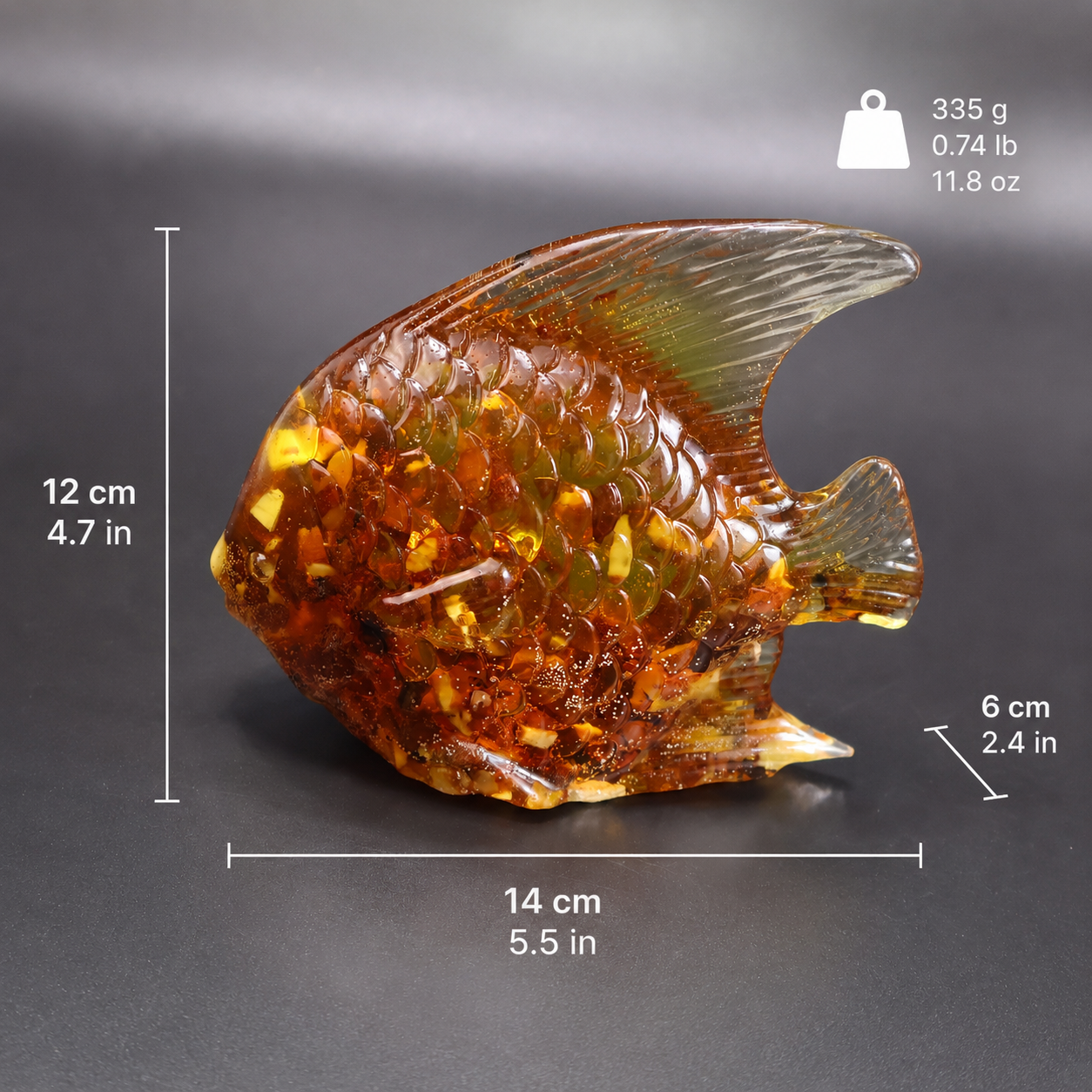 Dimension guide for handmade Baltic amber fish sculpture showing size and weight measurements on dark background