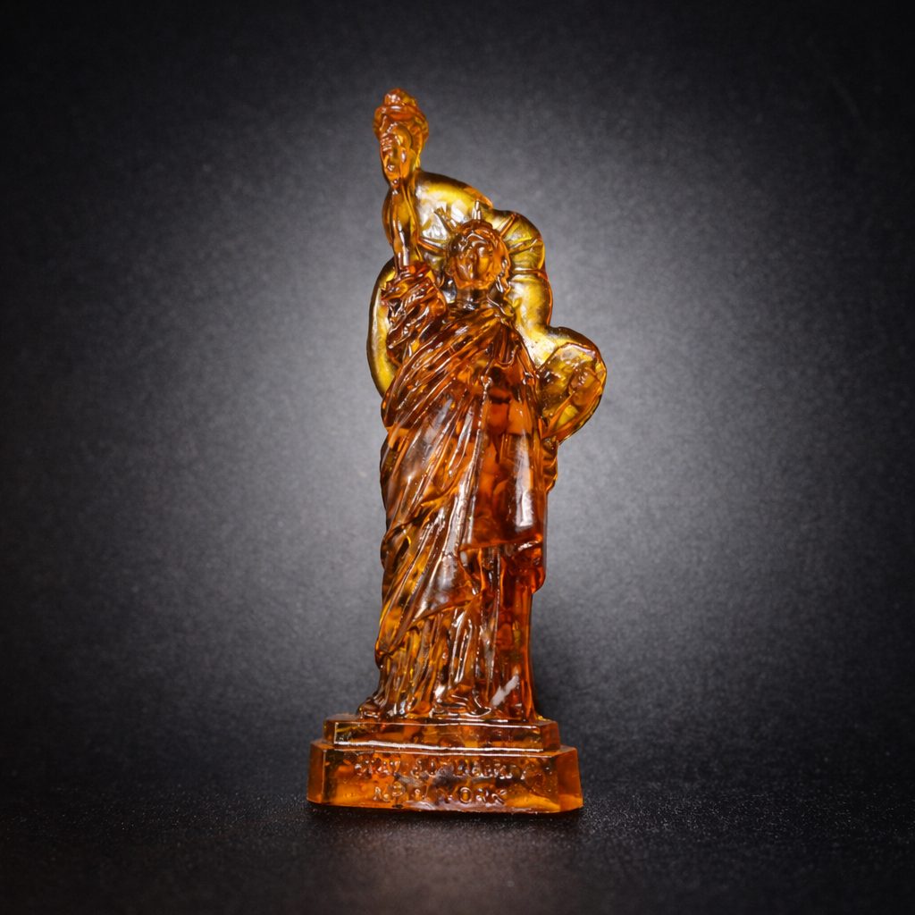 KIZIMA® Statue of Liberty Baltic amber figurine — genuine amber decor, handmade in USA, detail view
