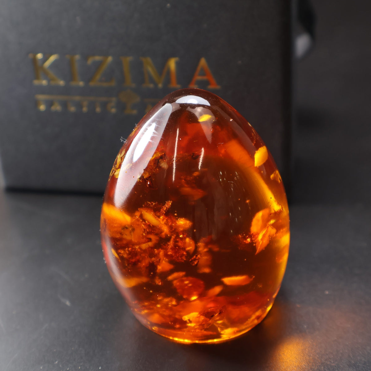 KIZIMA® amber Easter eggs figurine — genuine Baltic amber decor, handmade in USA, angled view