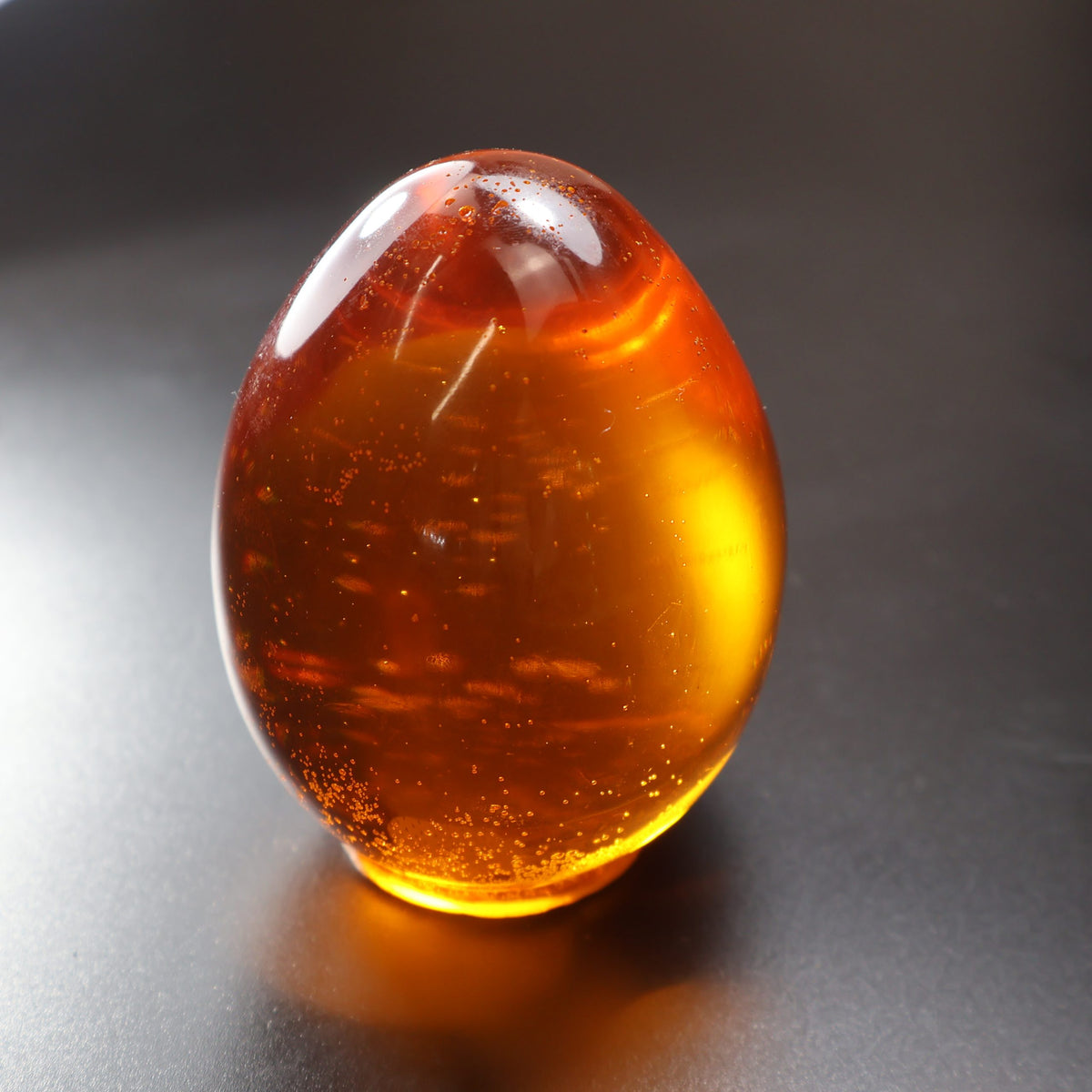 Baltic amber Easter eggs figurine by KIZIMA® — genuine amber, handmade in USA, side angle