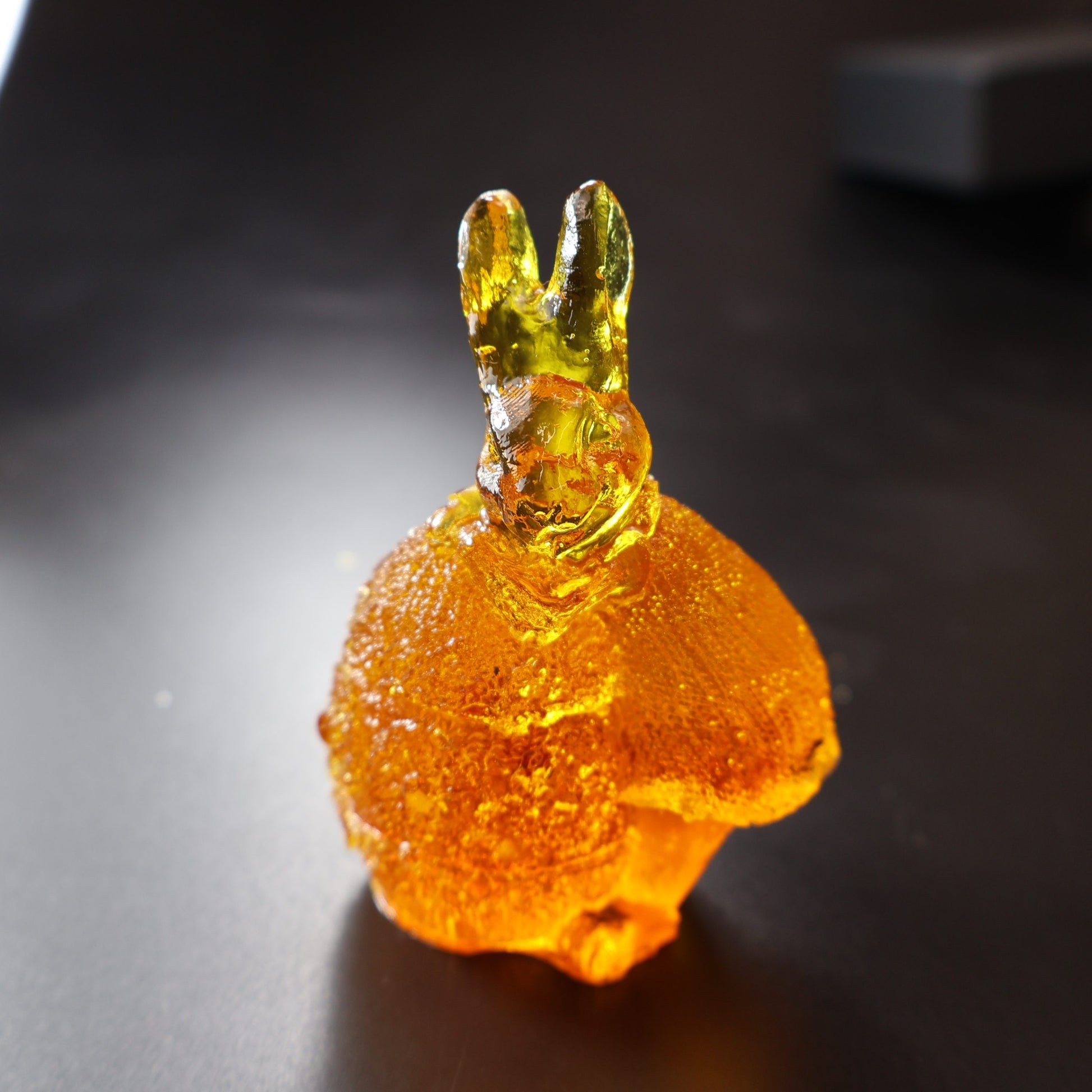 Baltic amber bunny on egg by KIZIMA® — genuine amber gift, handmade in USA, detail