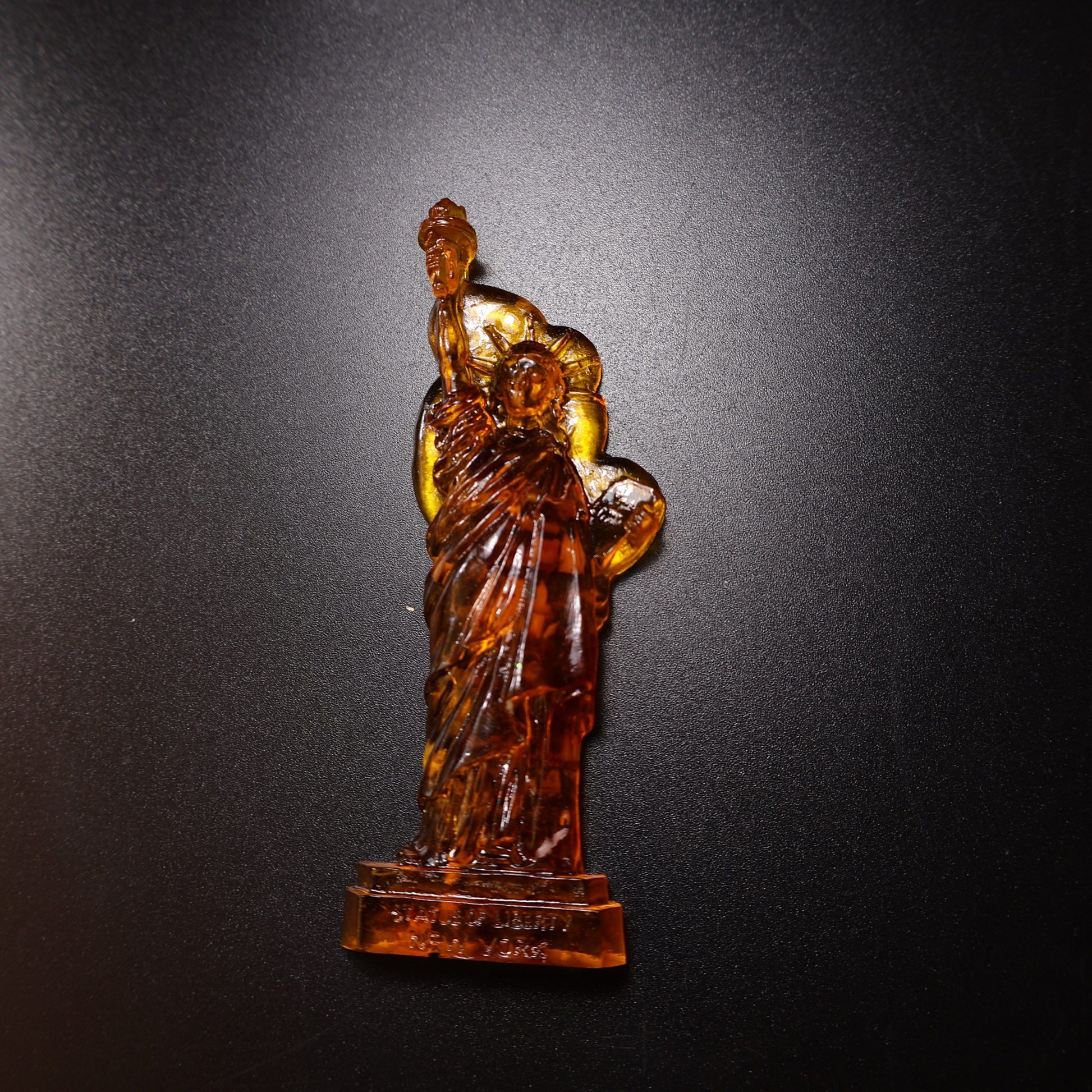 Handmade Baltic amber Statue of Liberty by KIZIMA® USA — natural amber decor, side view