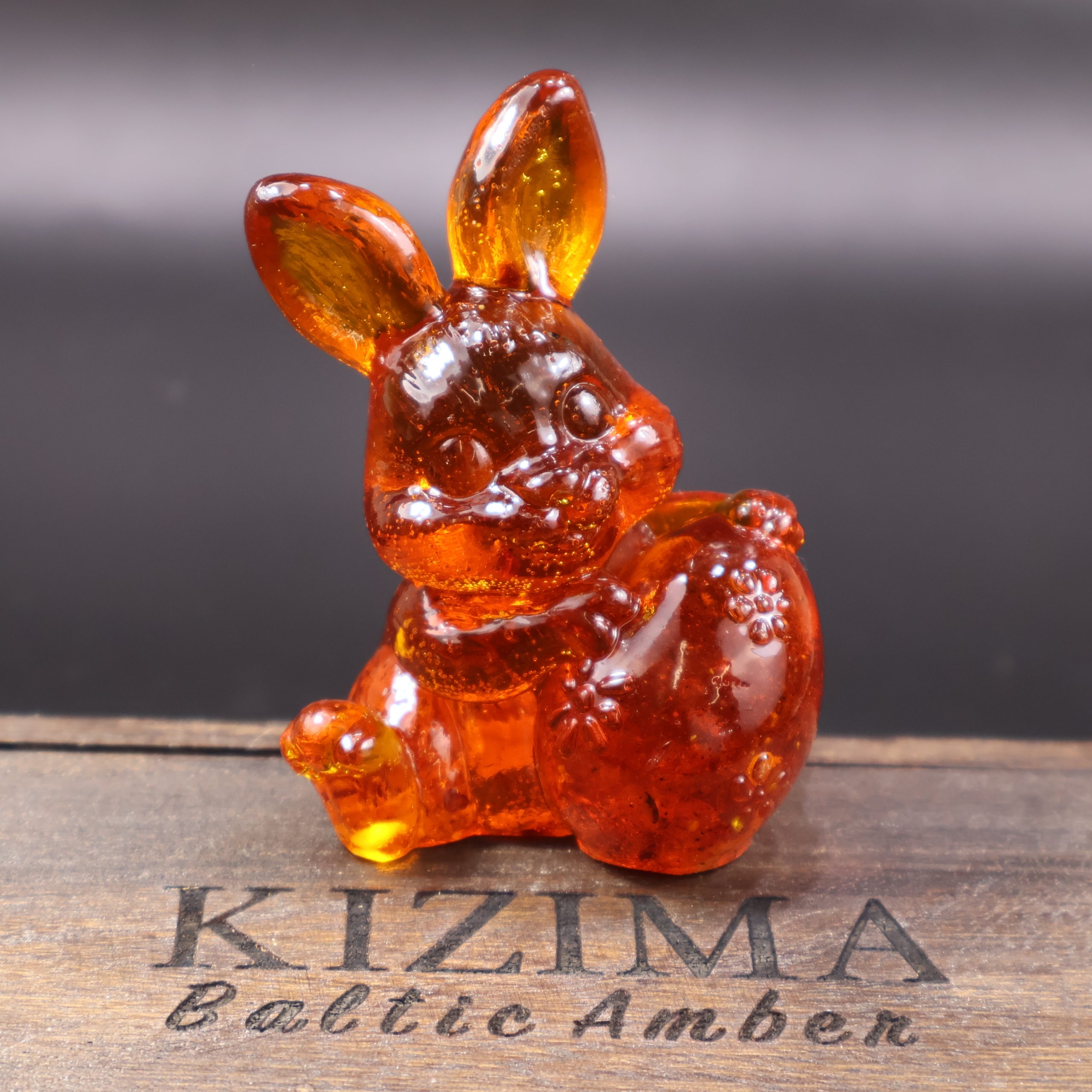 Amber Bunny Holding Egg