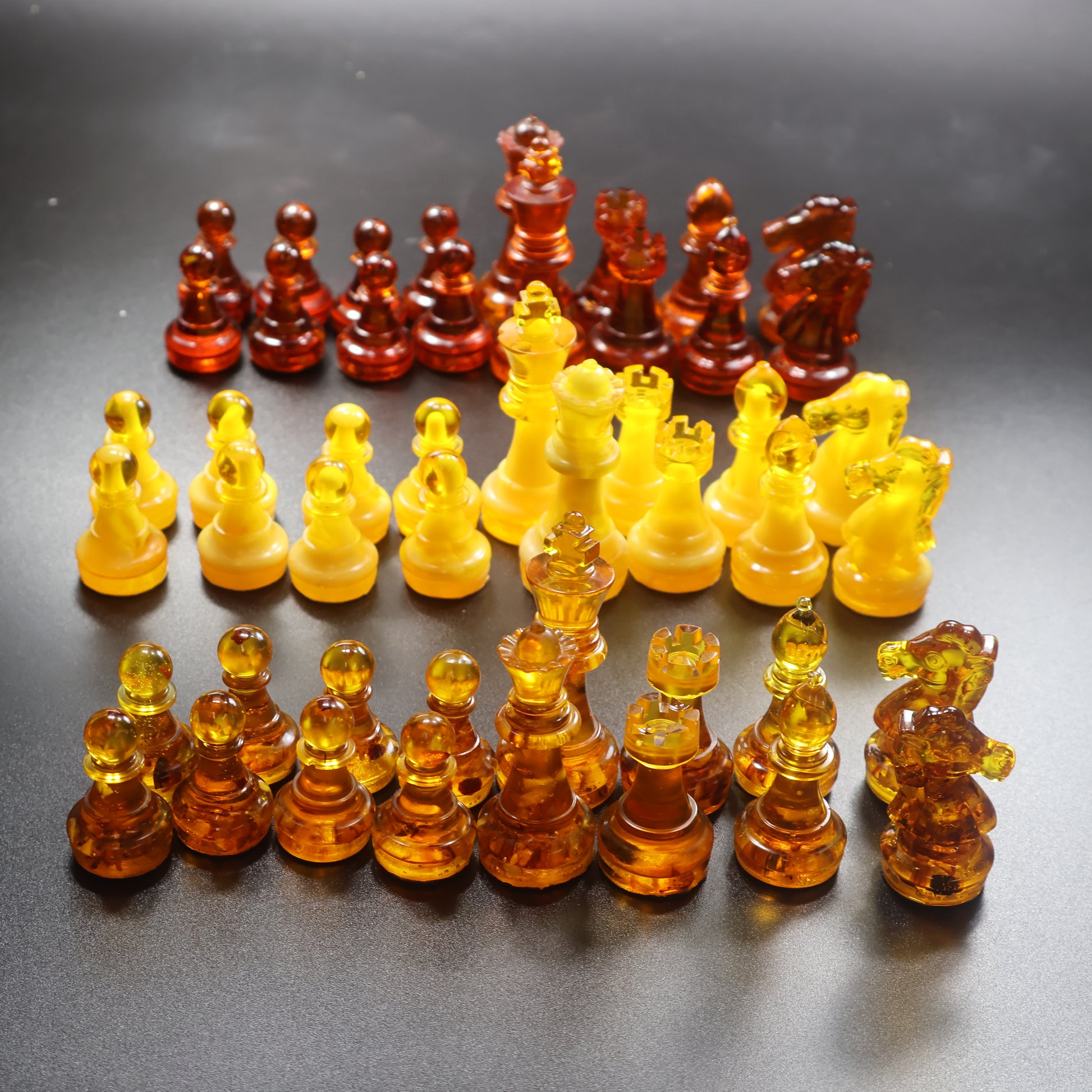Handcrafted Baltic amber chessmen set, 32 chess pieces in collector amber colors, KIZIMA Brooklyn