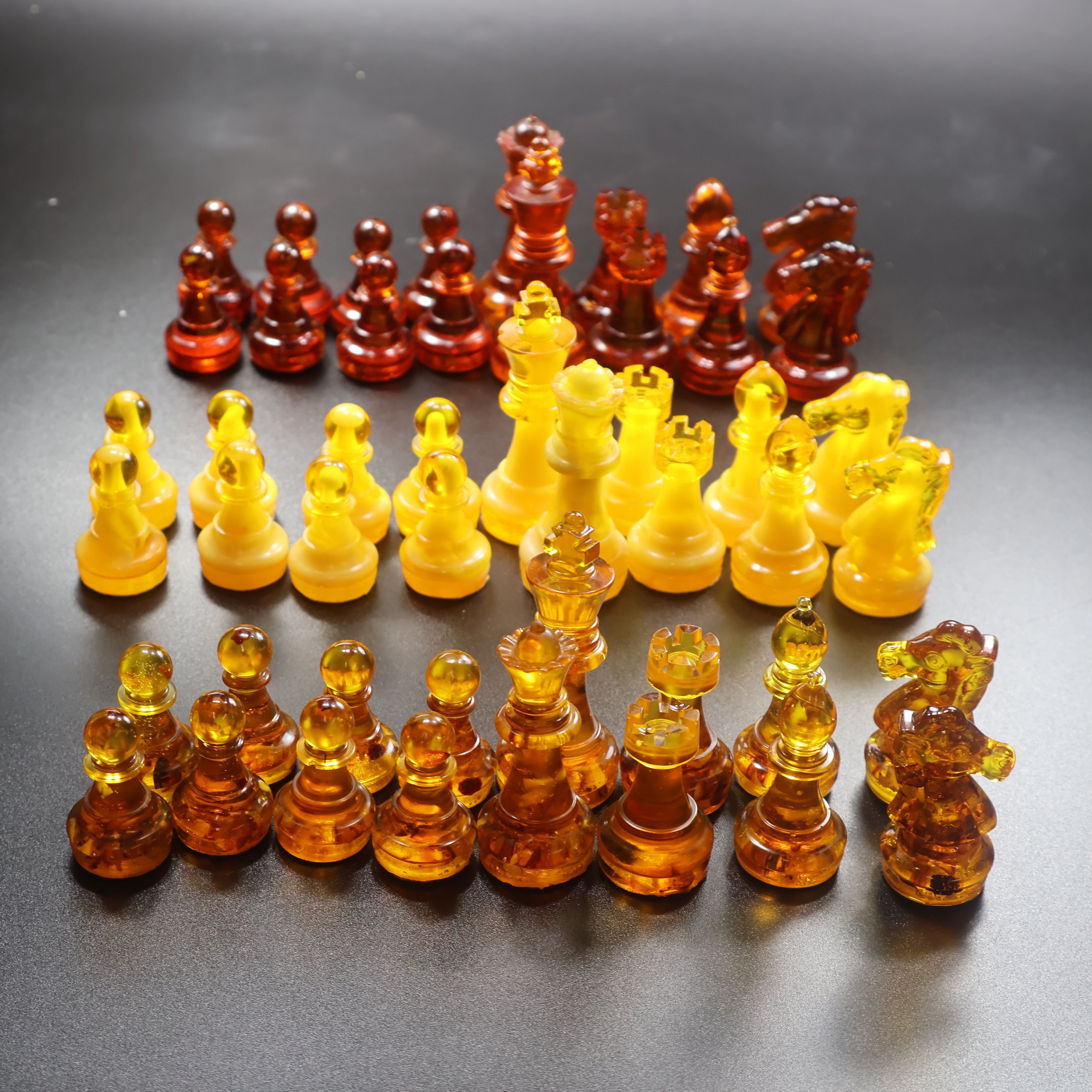 Handcrafted Baltic amber chessmen set, 32 chess pieces in collector amber colors, KIZIMA Brooklyn