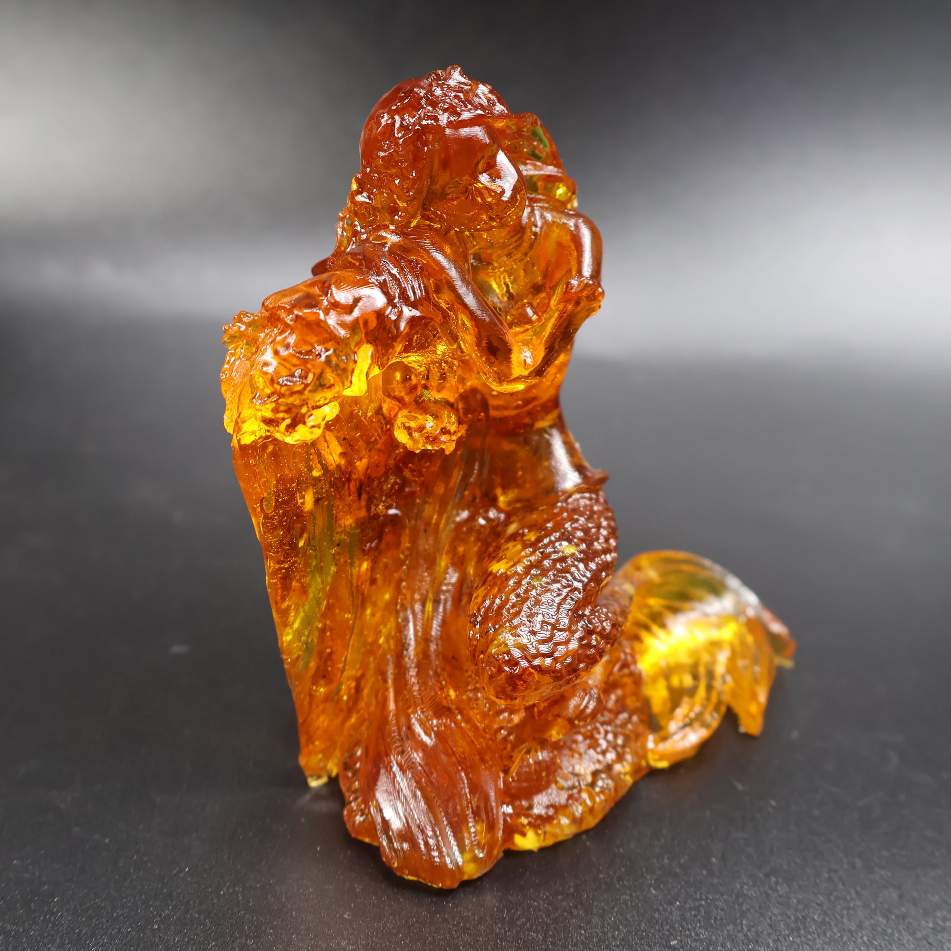 Handcrafted Baltic amber mermaid sculpture, front view, KIZIMA® Brooklyn