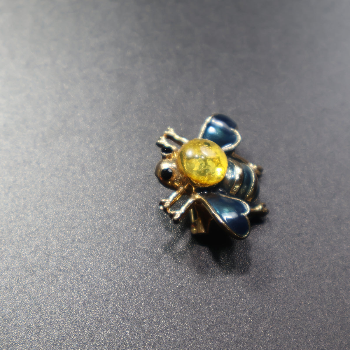Made in USA Genuine Natural Baltic Amber Bee Brooch by KIZIMA® — handmade amber jewelry, close-up