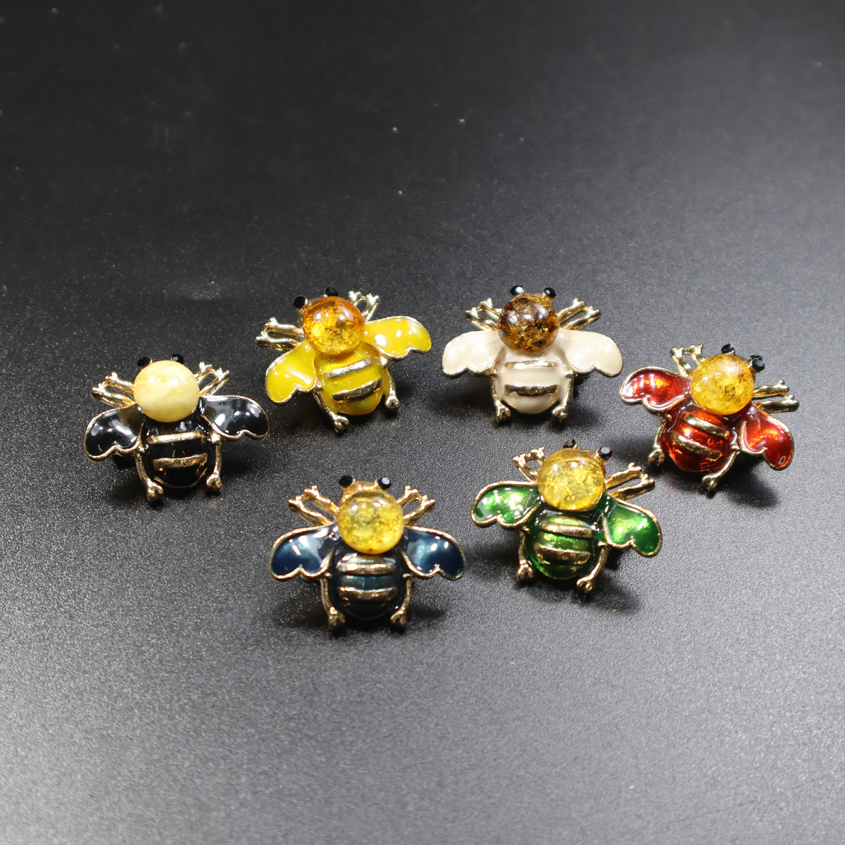 Made in USA Genuine Natural Baltic Amber Bee Brooch by KIZIMA® — handmade amber jewelry, angled view