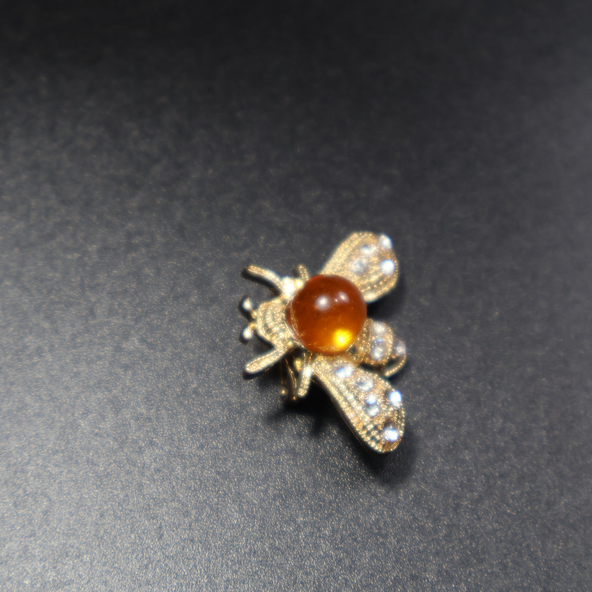 Made in USA Genuine Natural Baltic Amber Brooch for Women by KIZIMA® — handmade amber jewelry, angled view