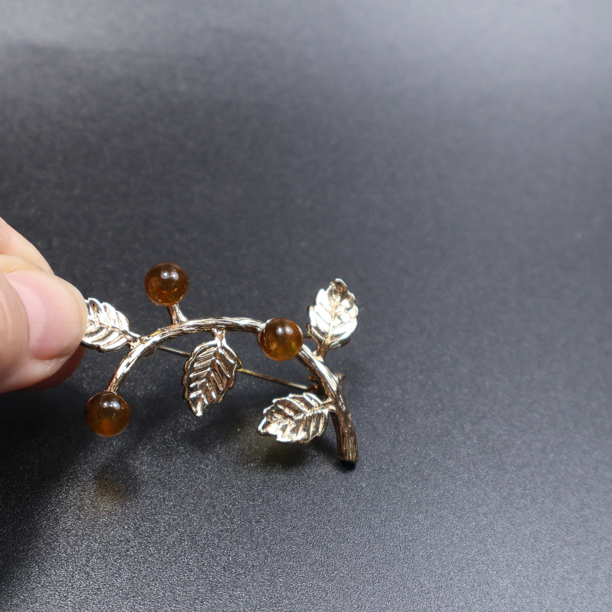 Made in USA Genuine Natural Baltic Amber Brooch Gift by KIZIMA® — handmade amber jewelry, close-up