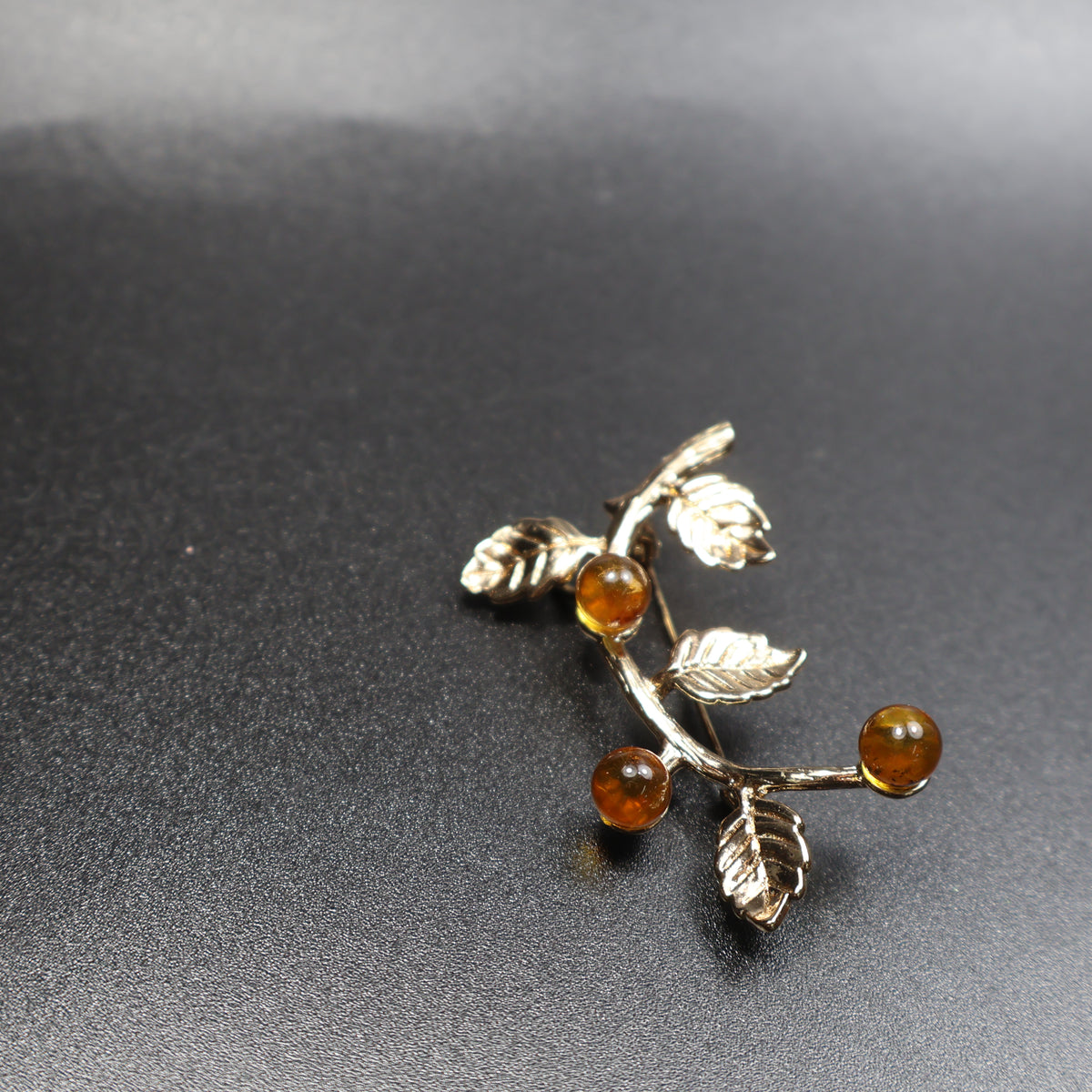 Made in USA Genuine Natural Baltic Amber Brooch Gift by KIZIMA® — handmade amber jewelry, back view with pin