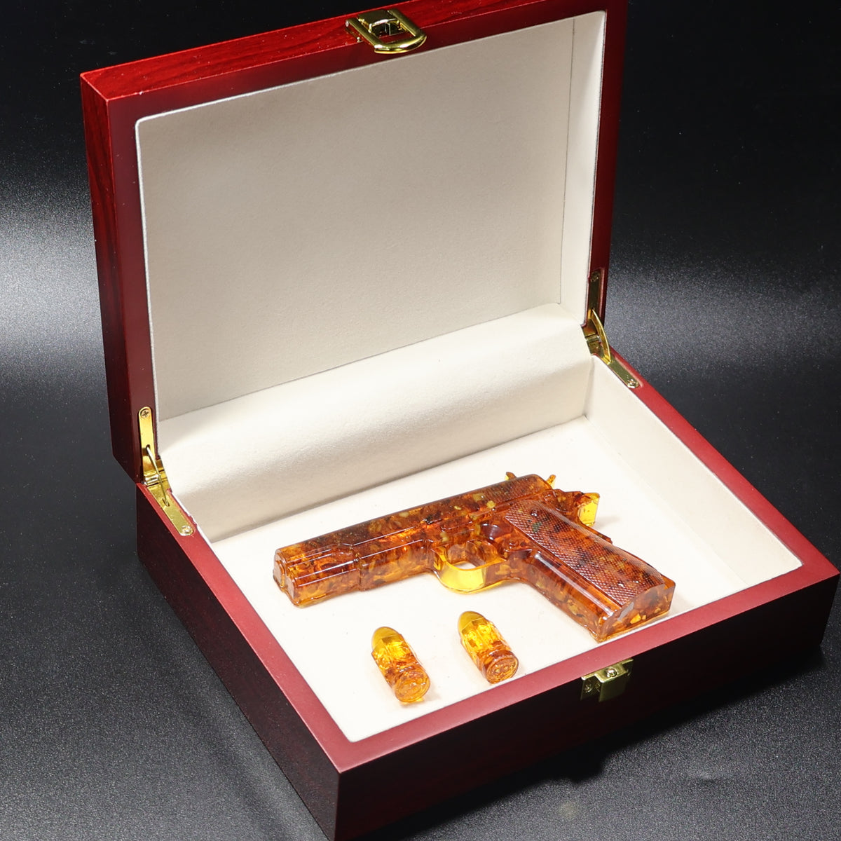 Made in USA Natural Baltic Amber Gun Figurine, Collectible Decor by KIZIMA® — handmade amber pistol sculpture, detail view