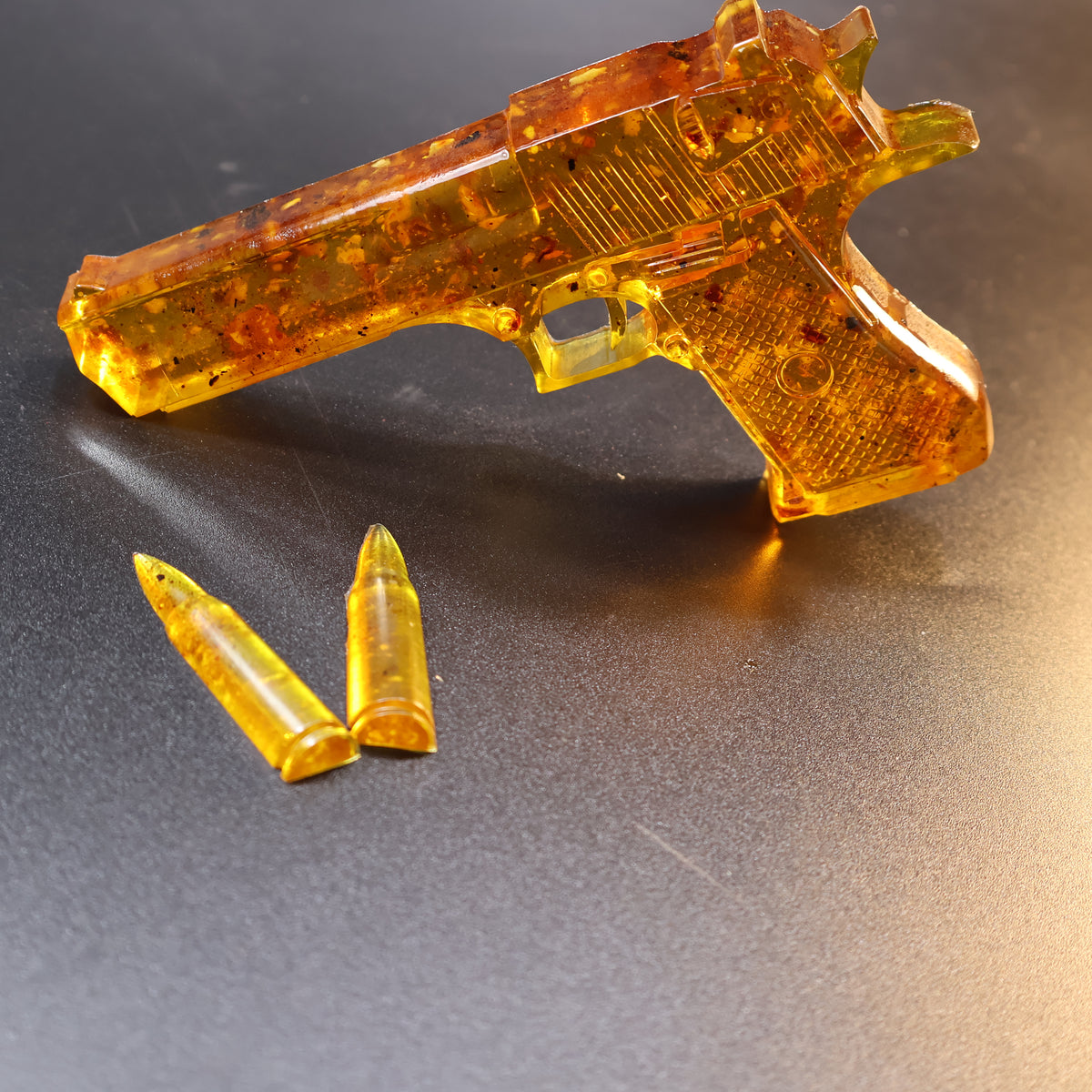 Made in USA Natural Baltic Amber Gun Figurine, Collectible Decor by KIZIMA® — handmade amber pistol sculpture, view 12