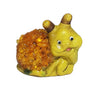 KIZIMA® Baltic amber snail figurine — genuine amber decor, handmade in USA, detail view