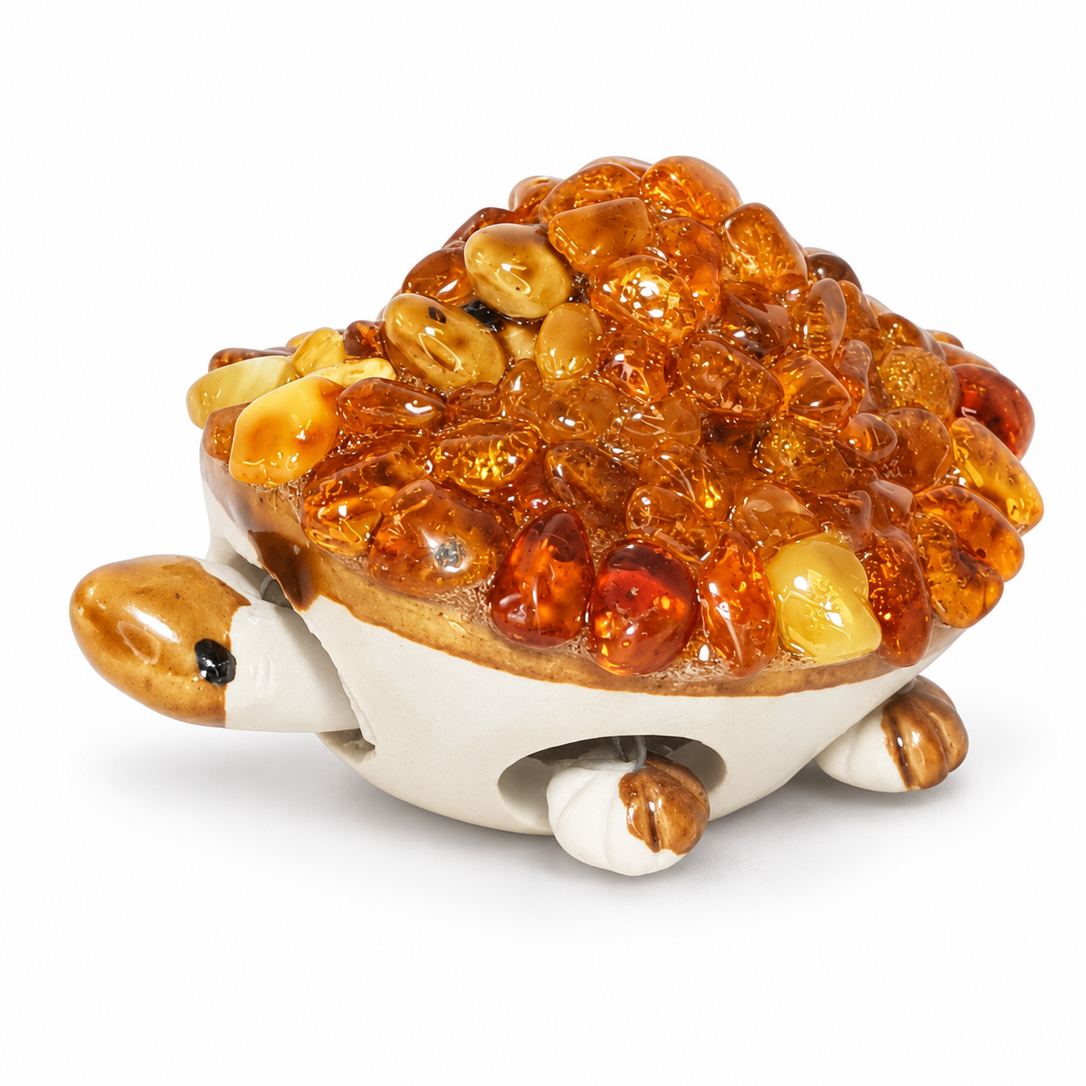 KIZIMA 10Z0100q53 Baltic amber turtle figurine on a white studio background, showing the cream ceramic movable body and golden amber pebble shell.