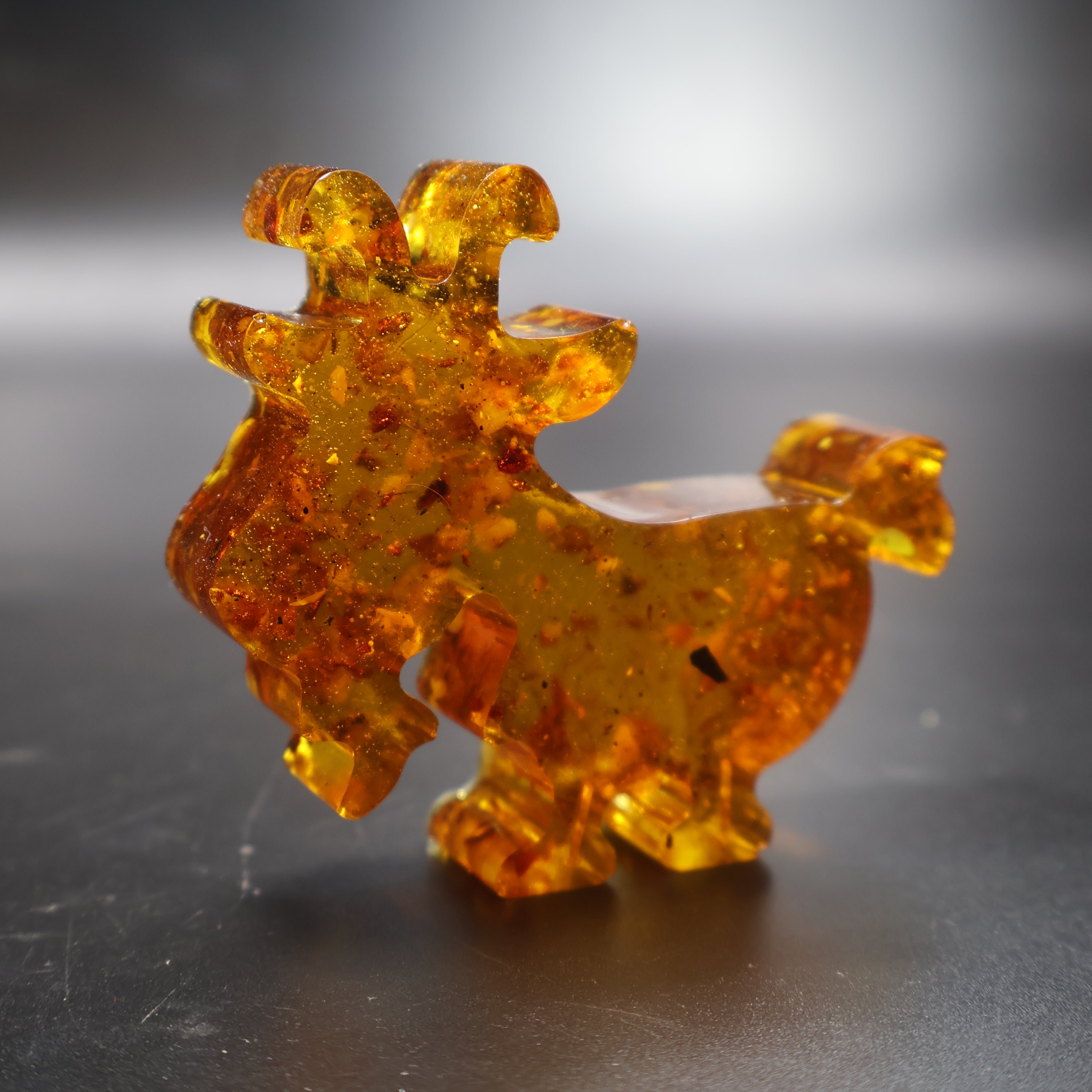 Made in USA natural Baltic amber goat figurine Christmas decor by KIZIMA front view