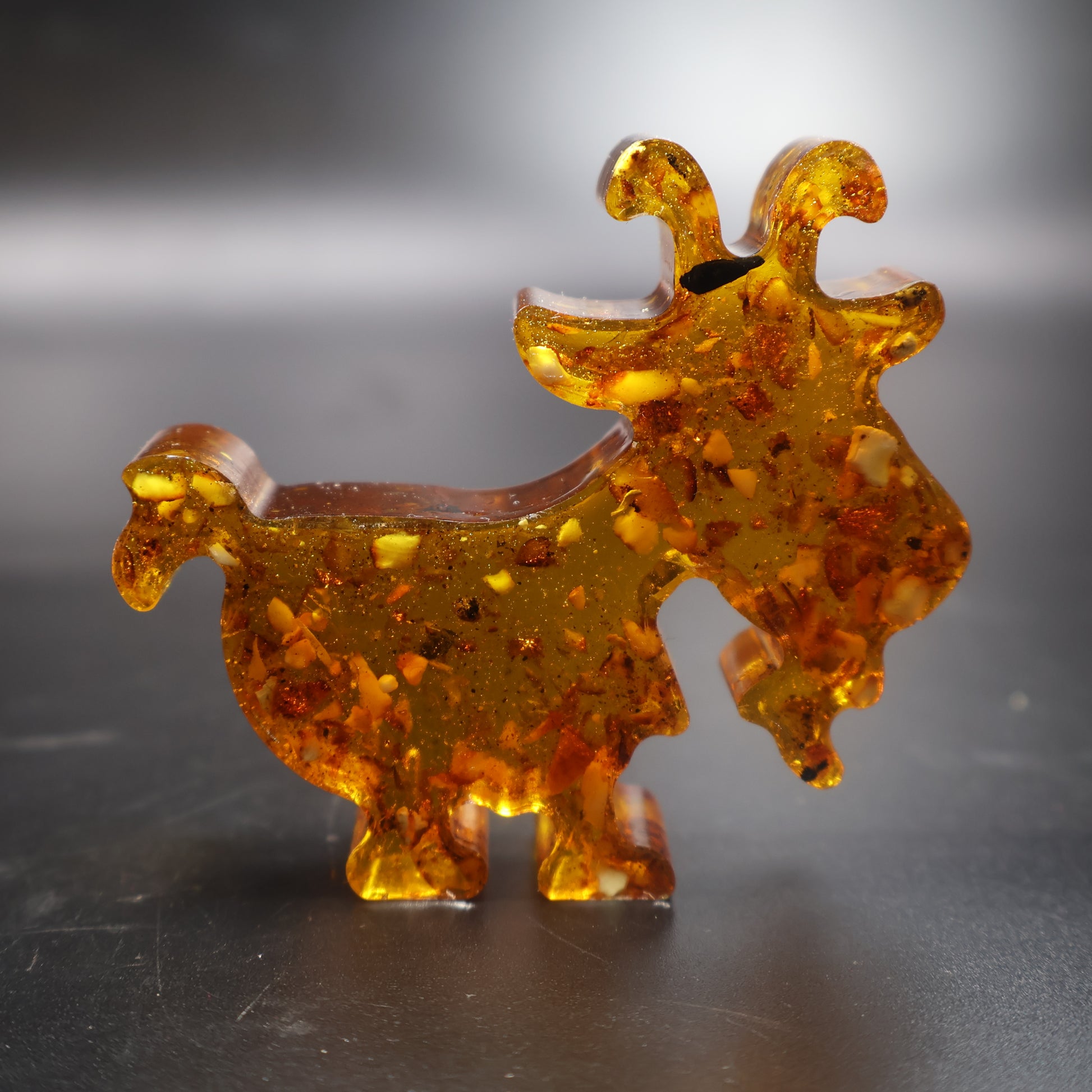 Handmade Baltic amber goat figurine Capricorn zodiac gift KIZIMA side view
