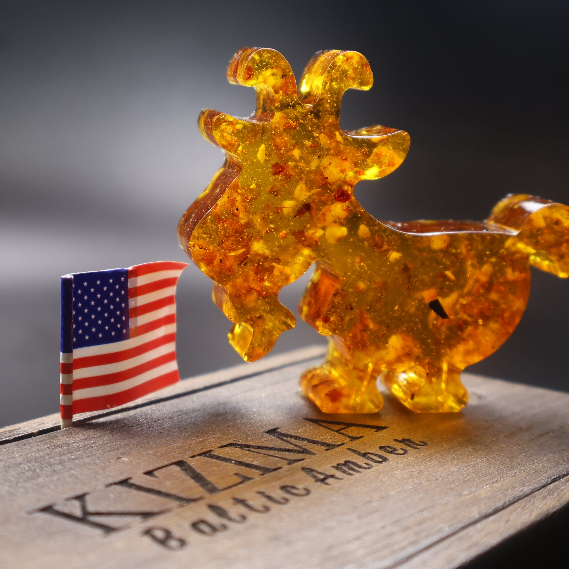 Natural amber goat figurine Christmas decor detail view