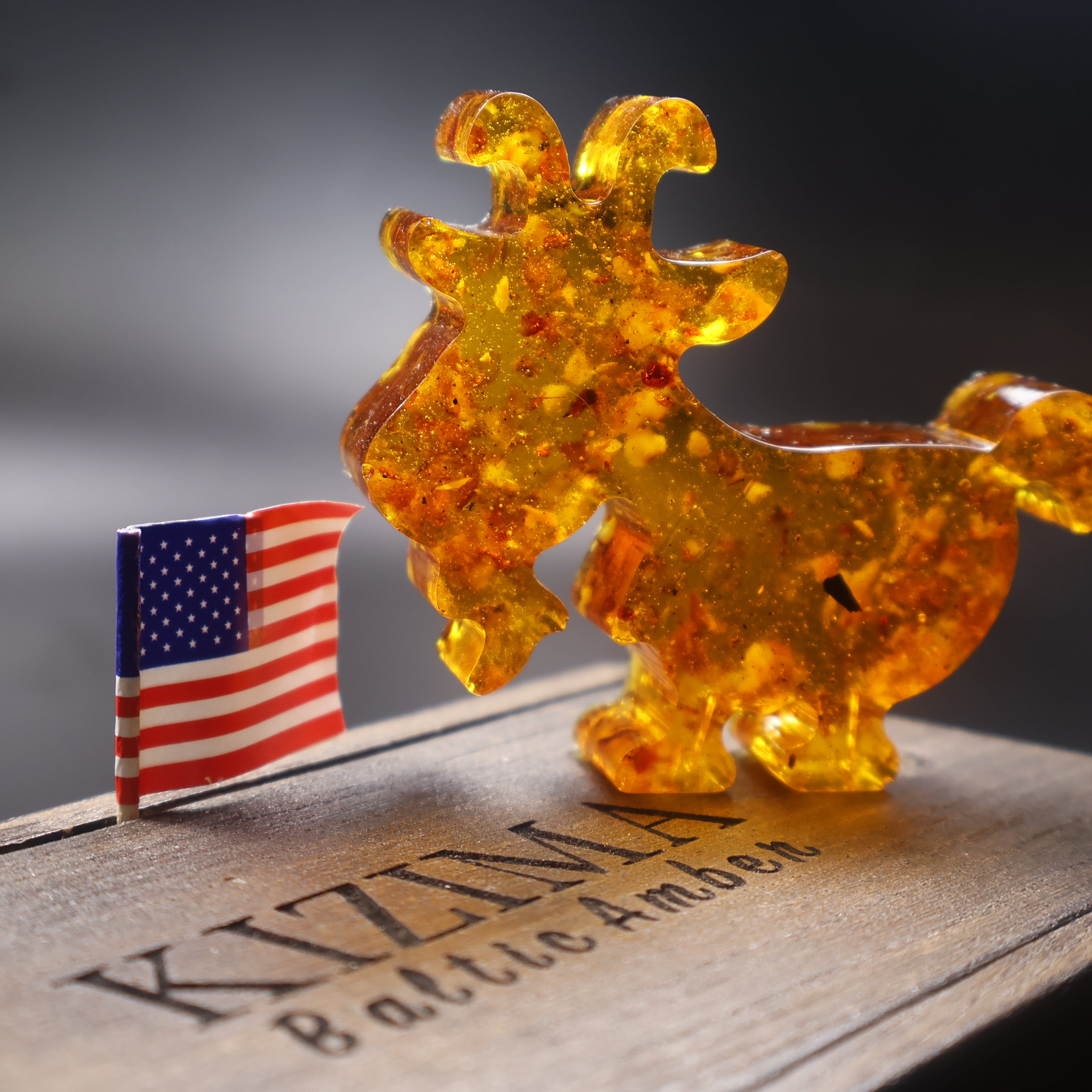 Natural amber goat figurine Christmas decor detail view