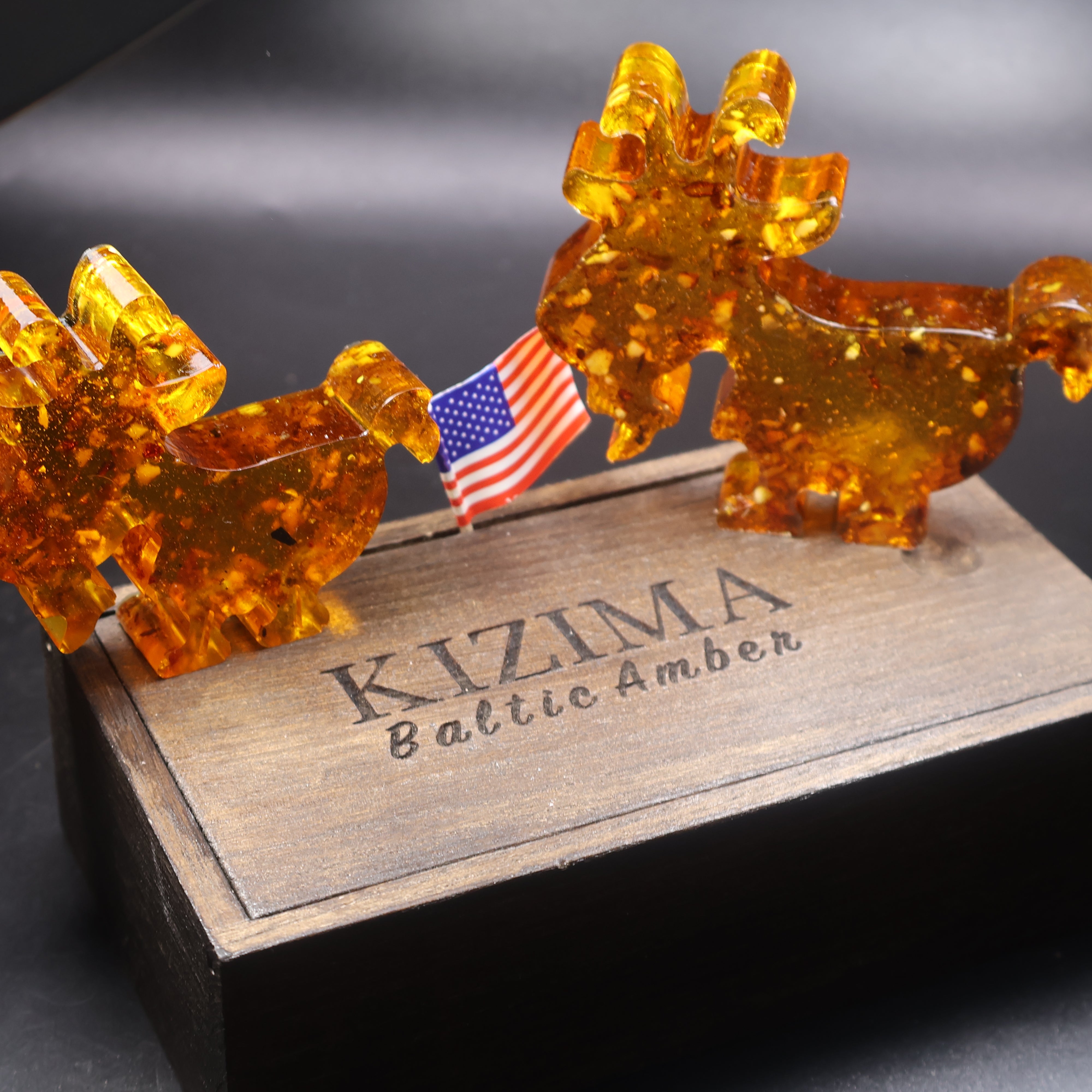 Handmade natural Baltic amber goat figurine KIZIMA studio photo