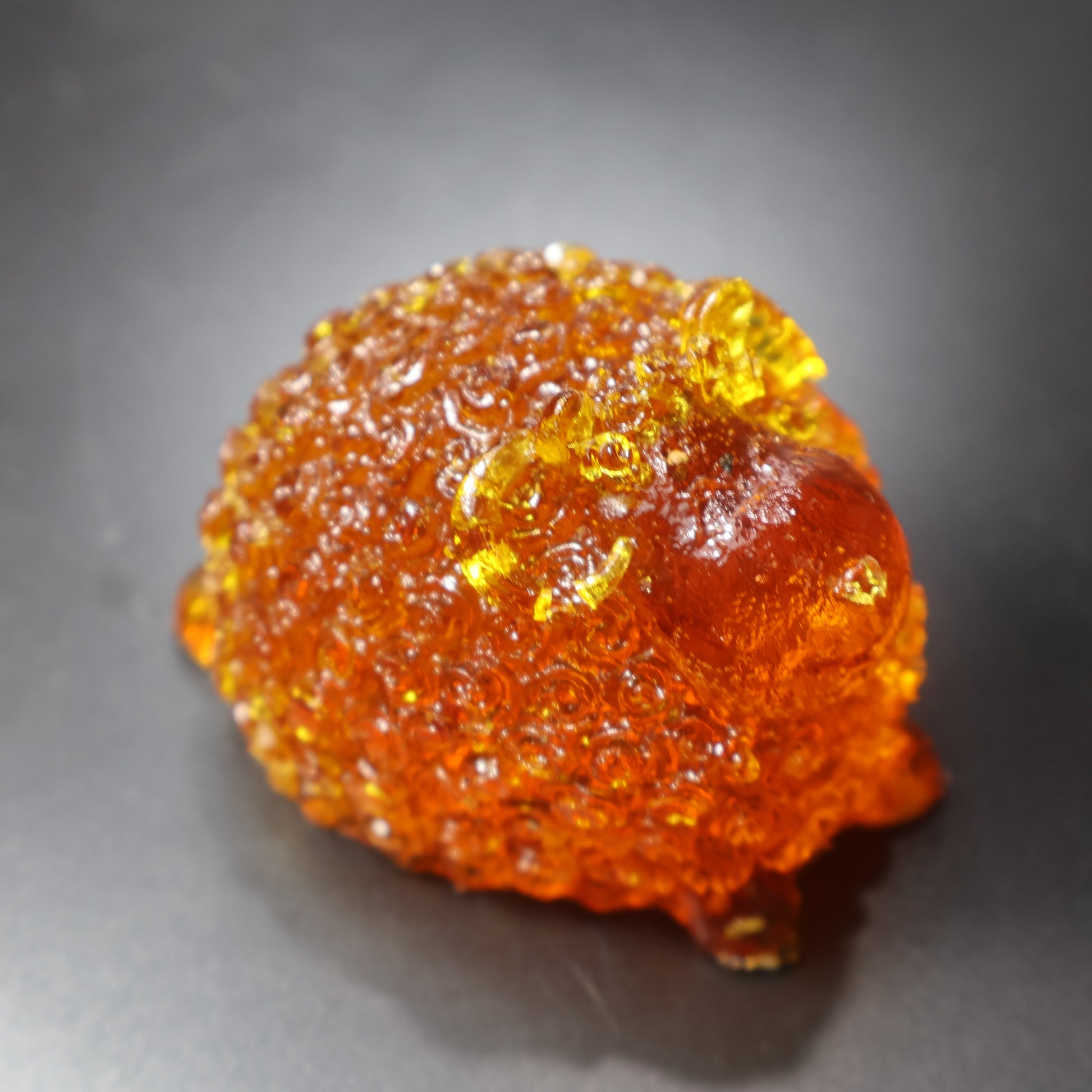 Handcrafted amber ram figurine with curved horns golden Baltic amber